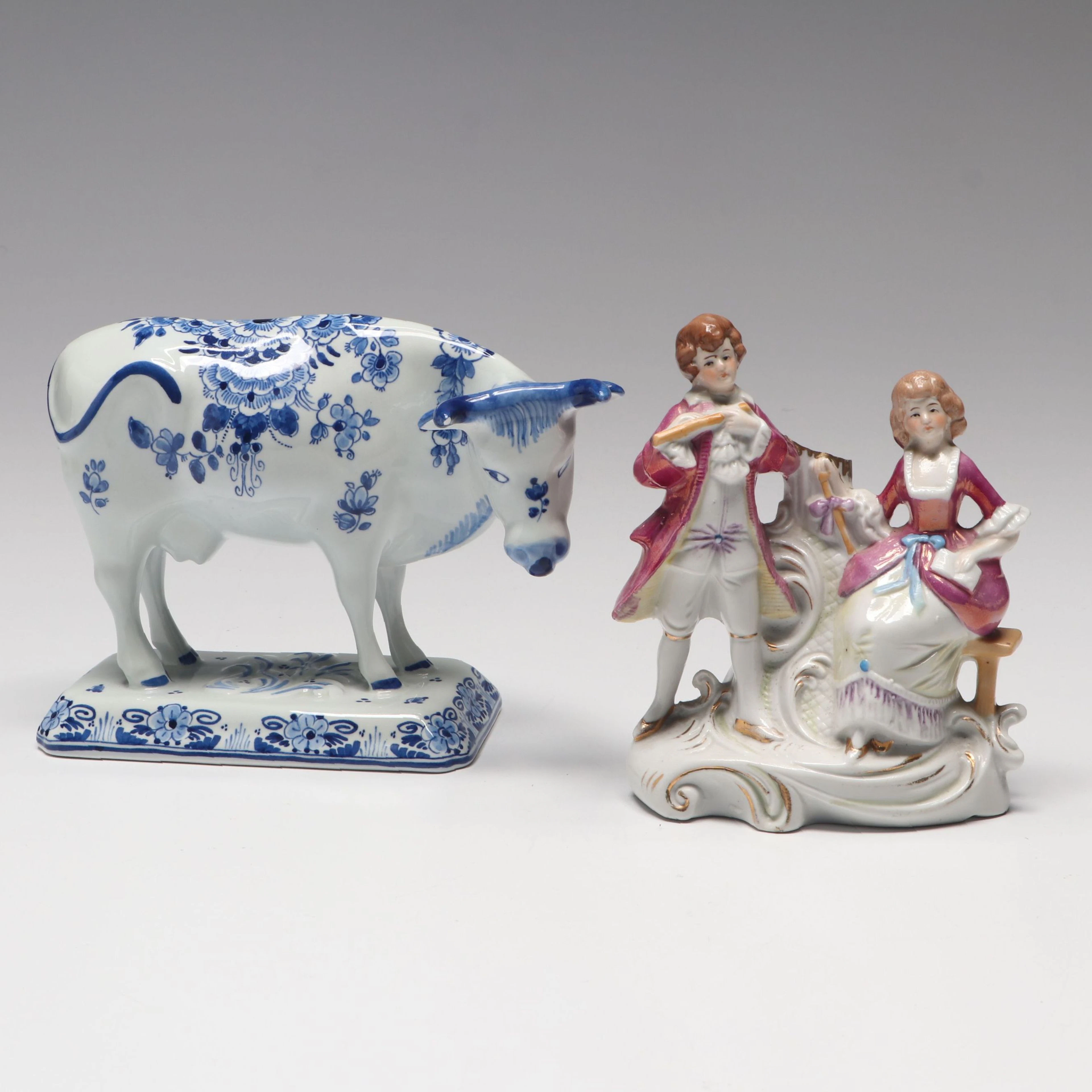 Delftware Cow Figurine with Colonial Style Figural Bud Vase, 20th Century