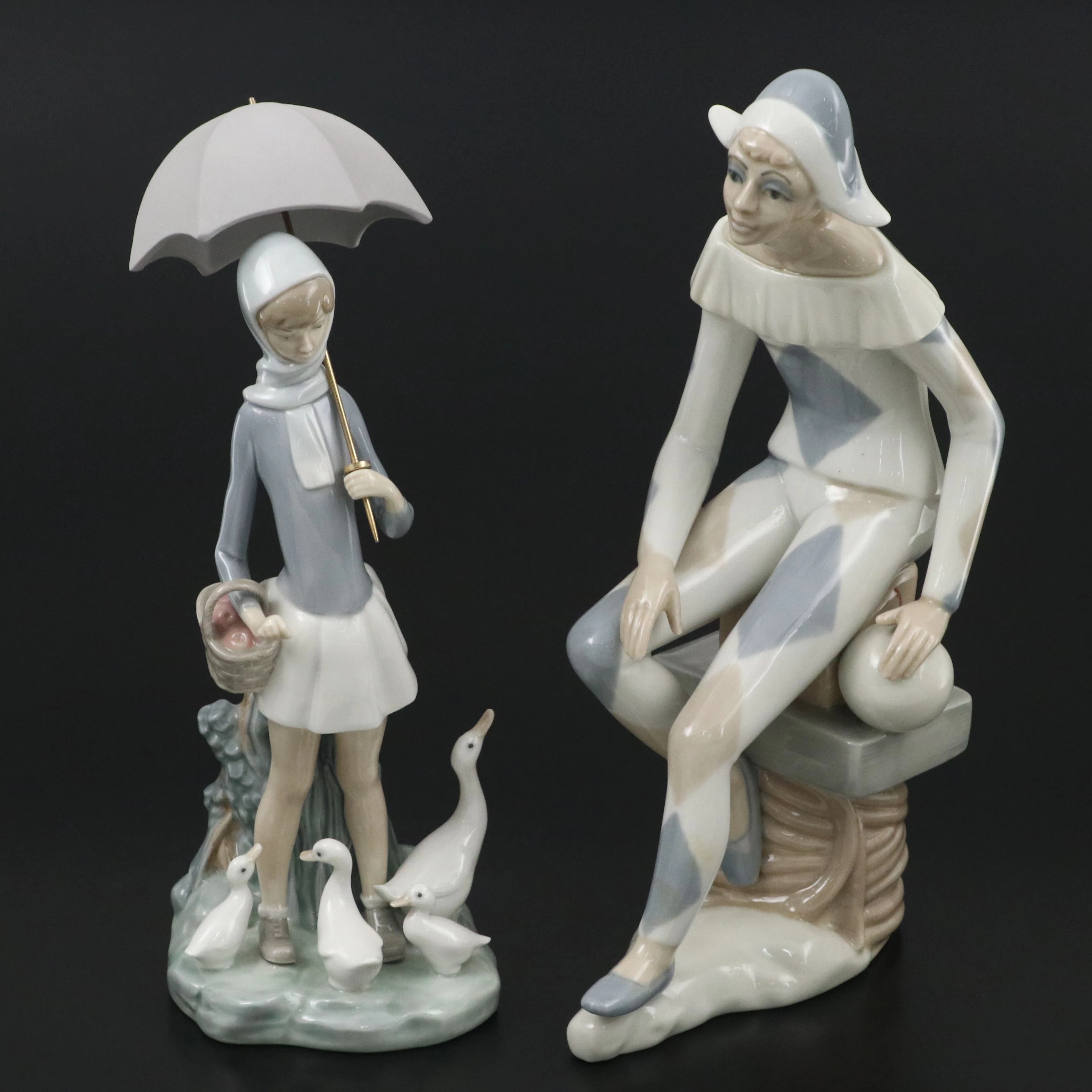 Lladró "Girl with Umbrella and Geese" and "Sitting Harlequin" Figurines