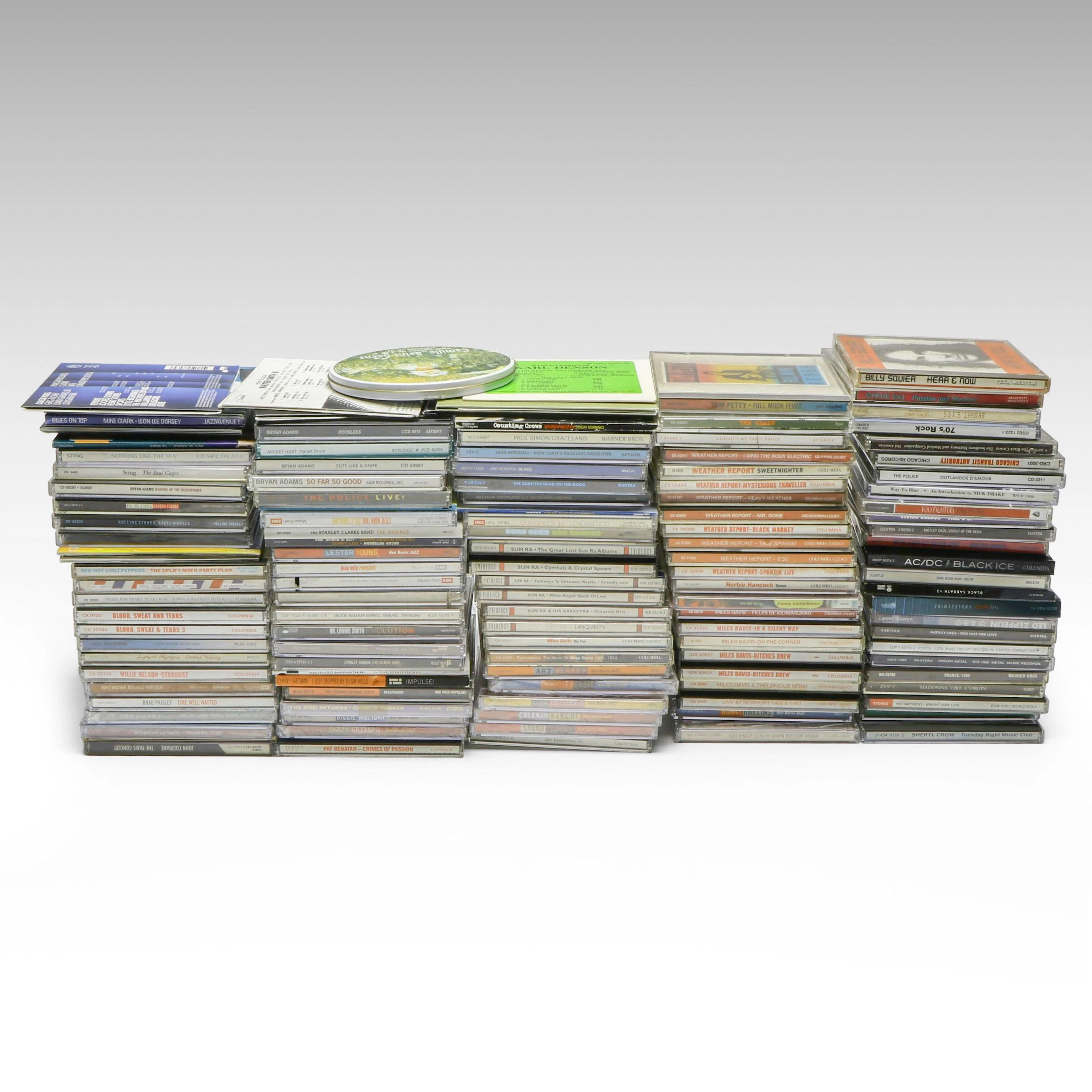 Miles Davis, AC/DC, Madonna, Jimi Hendrix and More Music CDs