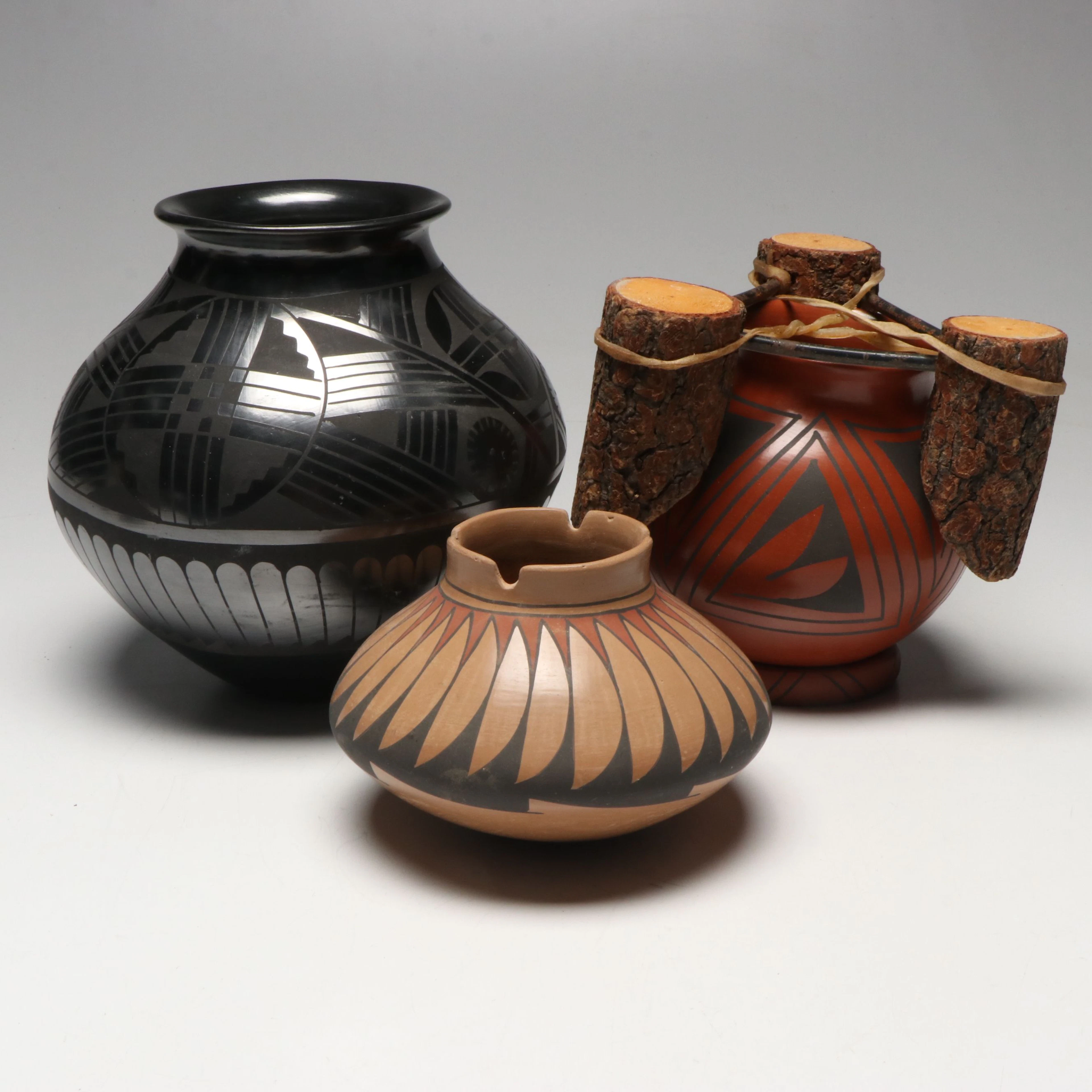 Jesus Peña Blackware Pot with More Mata Ortiz Pottery Vessels
