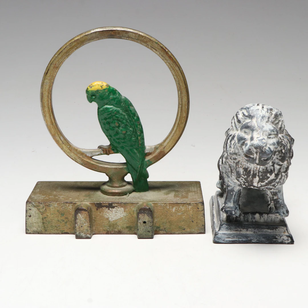 Parrot in Ring and Standing Lion Cast Metal Doorstops