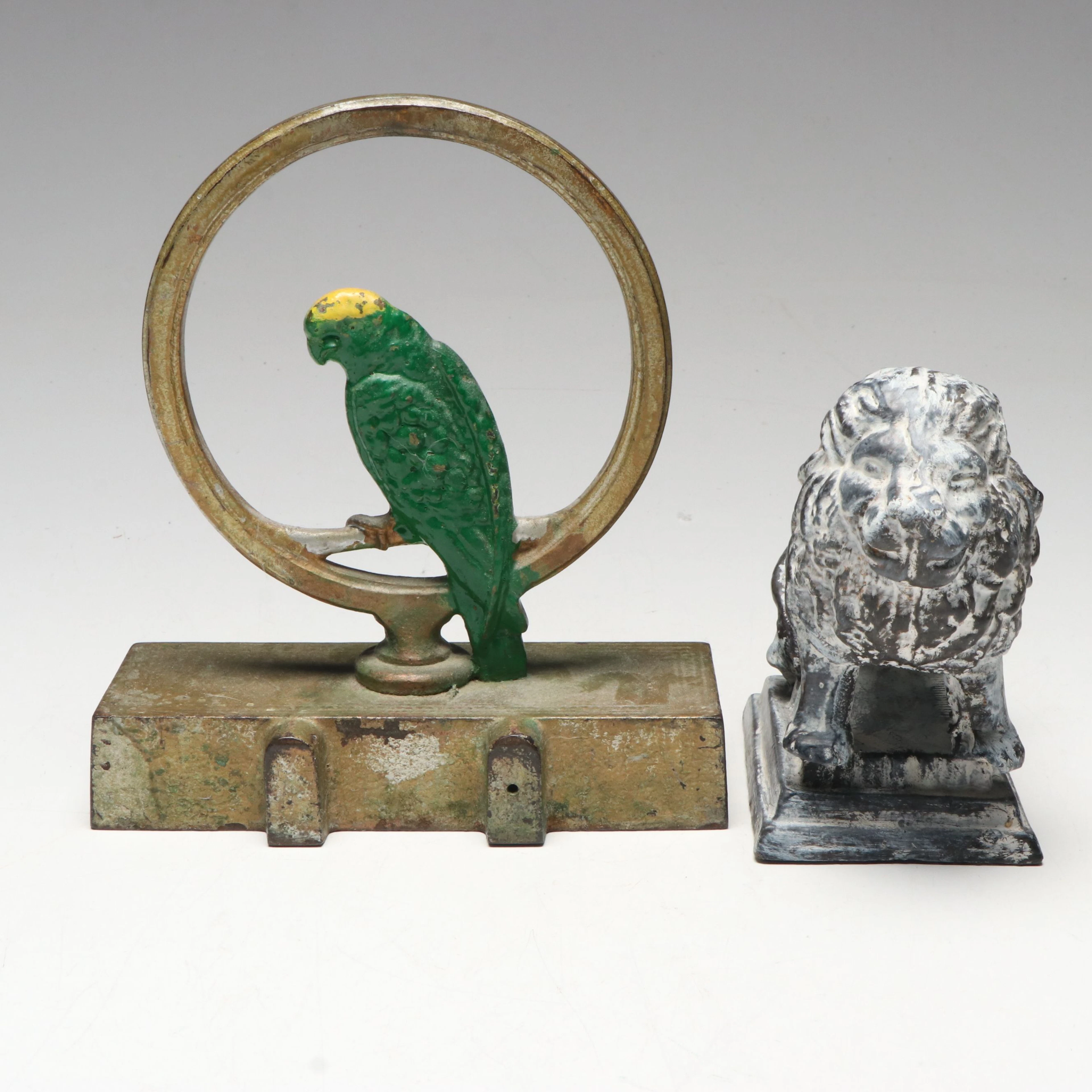 Parrot in Ring and Standing Lion Cast Metal Doorstops