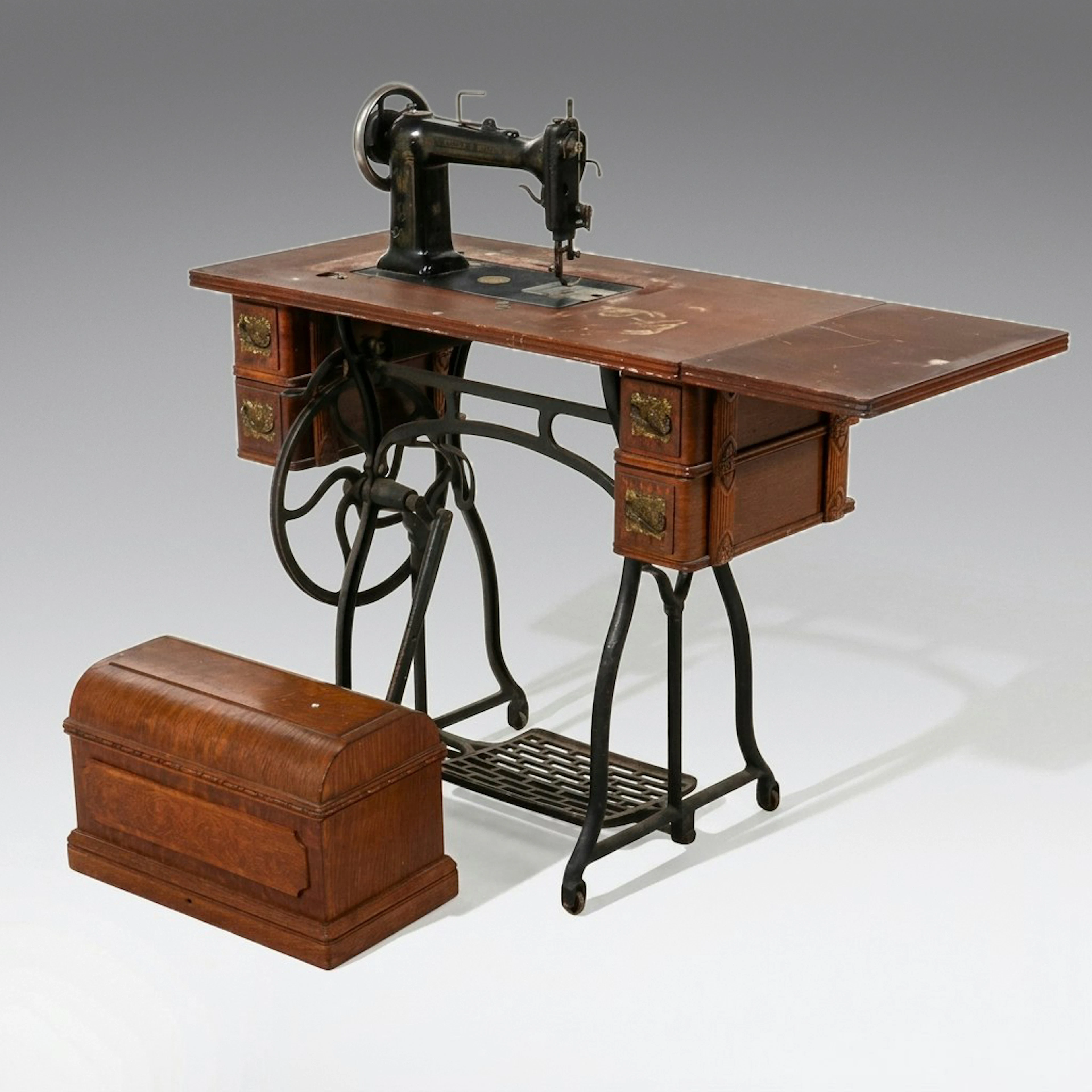 Wheeler & Wilson Treadle Sewing Machine in Oak & Cast Iron Table, Circa 1895