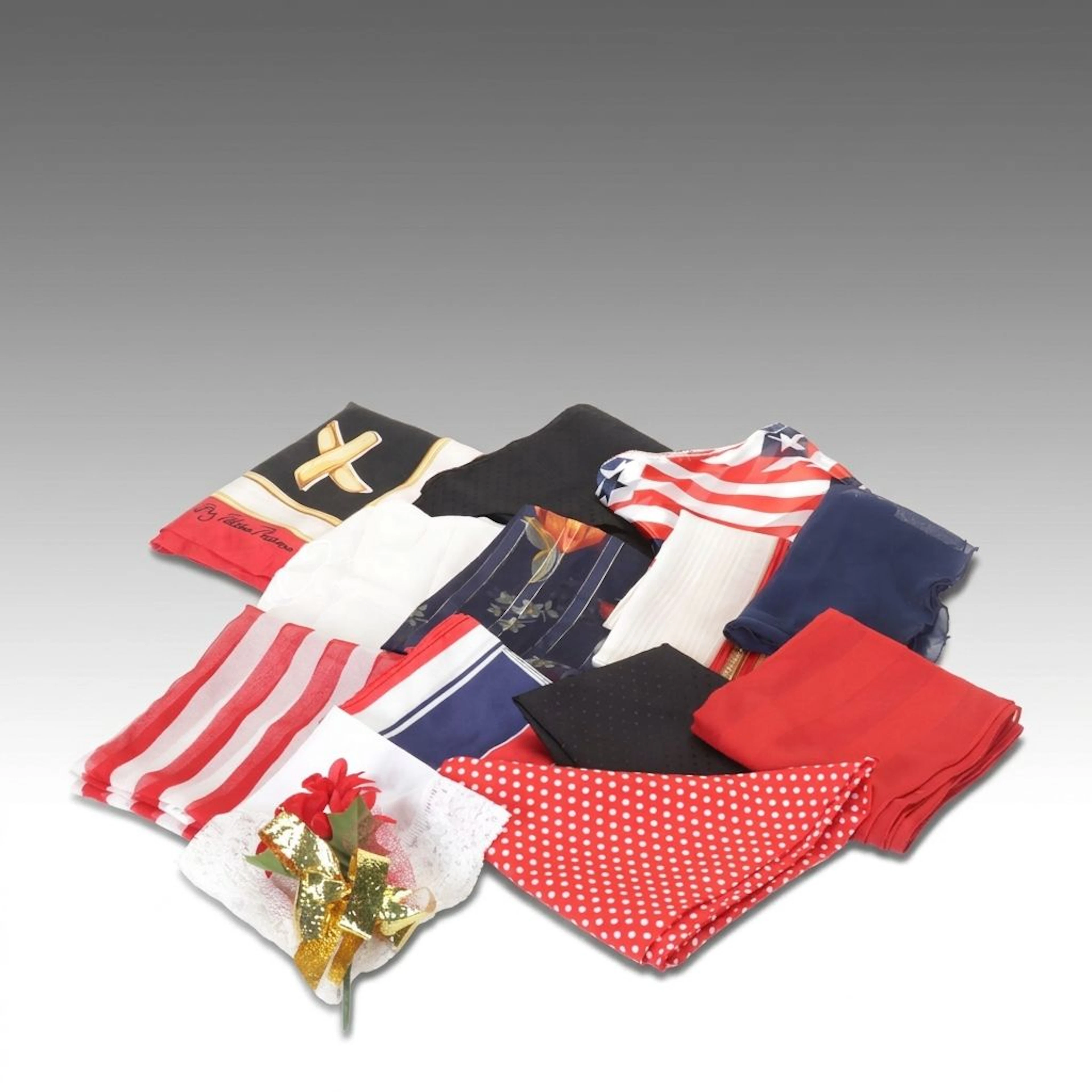 Paloma Picasso, Jaclyn Smith and More Red, White and Navy Patterned Scarves