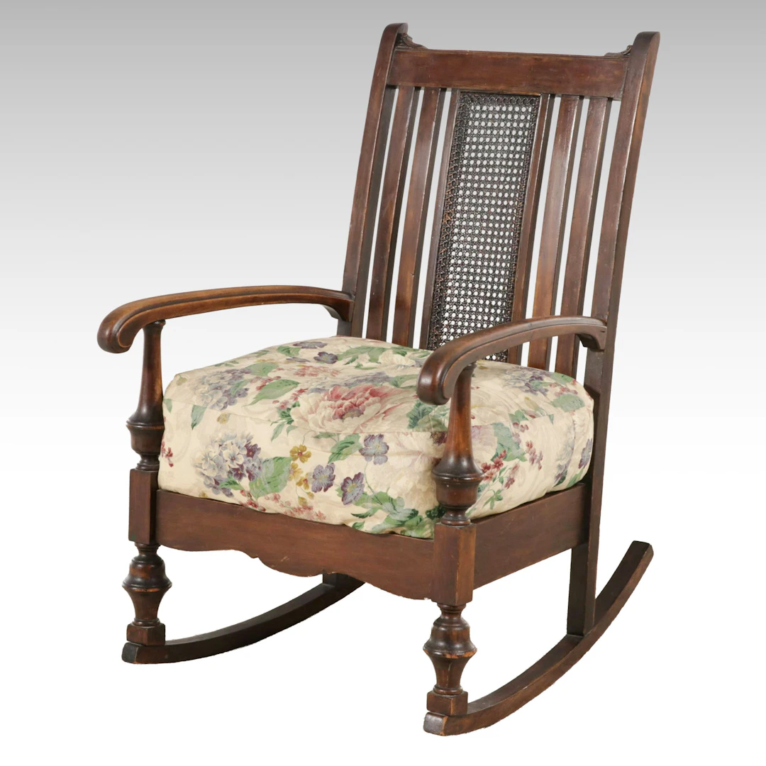 Victorian Style Wood Rocking Chair with Caned Back and Floral Cushion