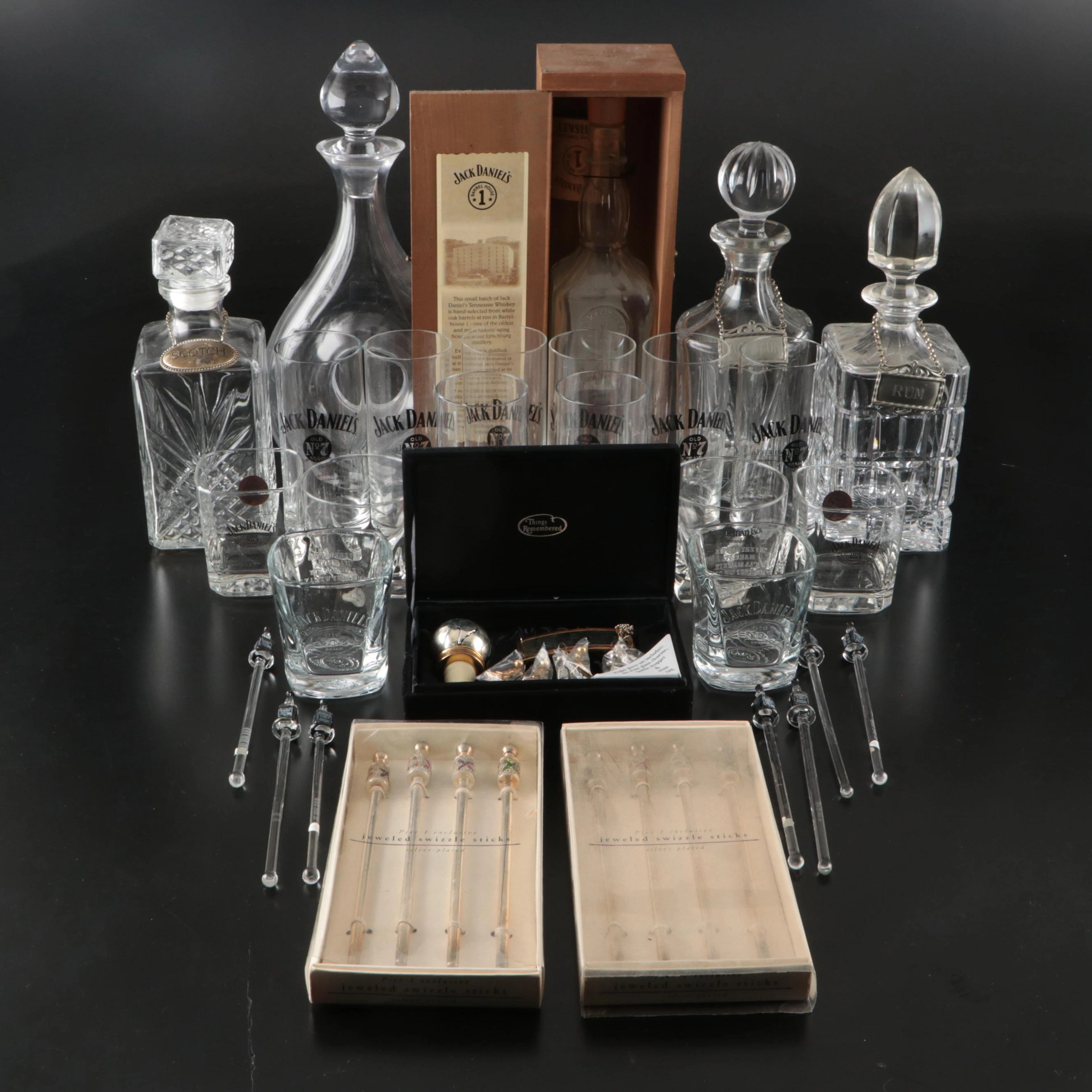 Jack Daniels Glass Whiskey Bottle with Other Glassware and Bar Accessories