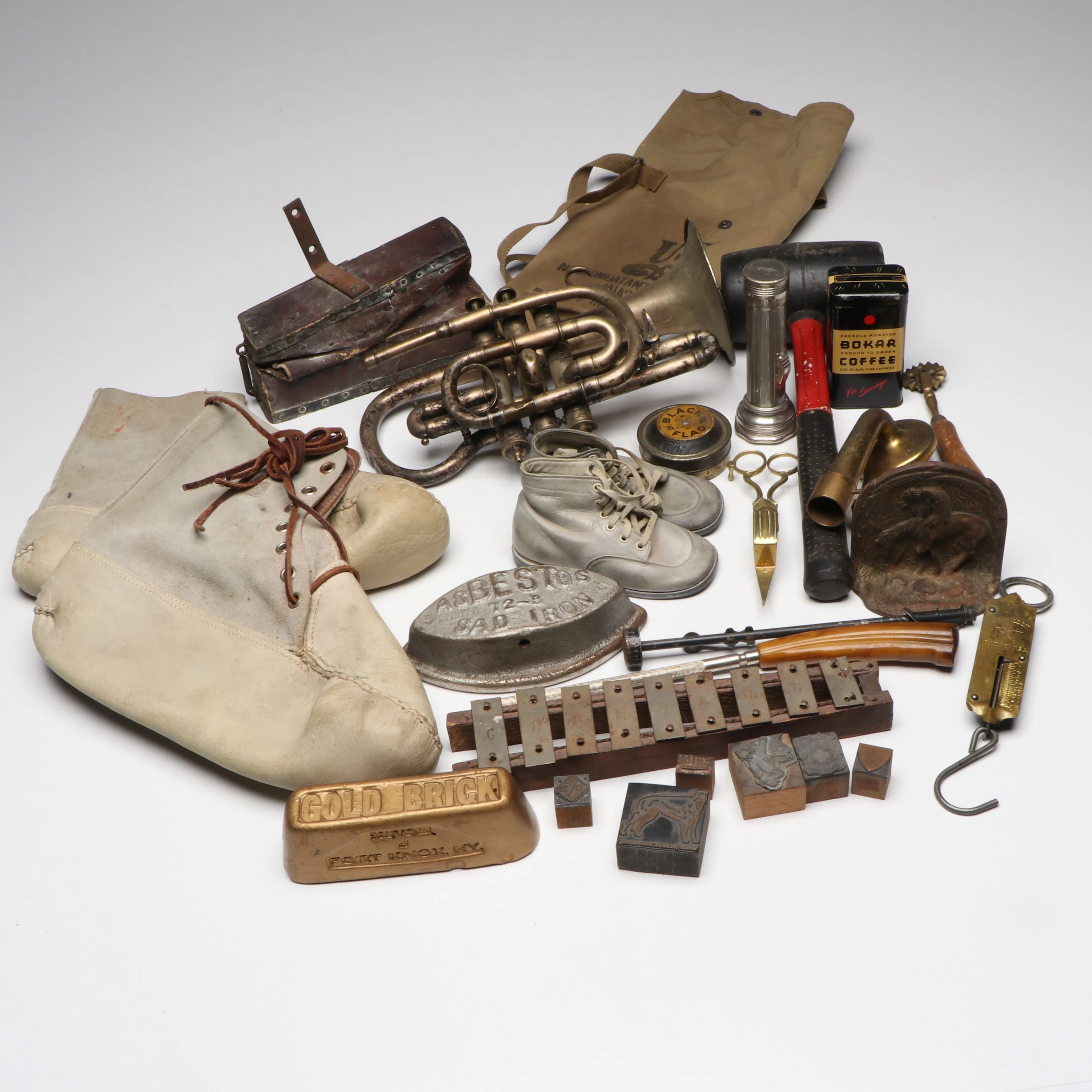Metal Cornet, Cast Iron "End of the Trail" and Other Antique and Rustic Décor