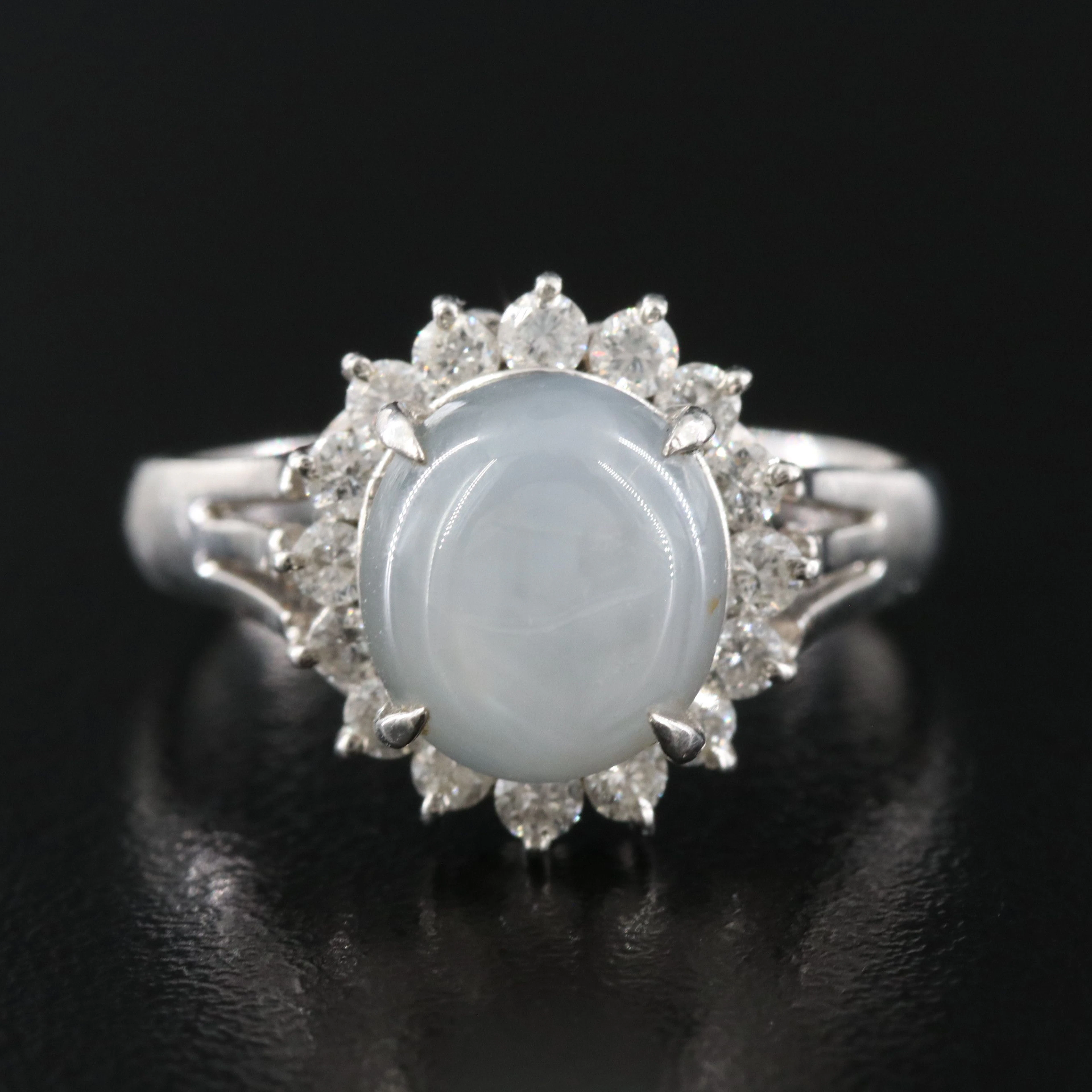 Platinum 5.48 CT Star Sapphire and Diamond Halo Ring