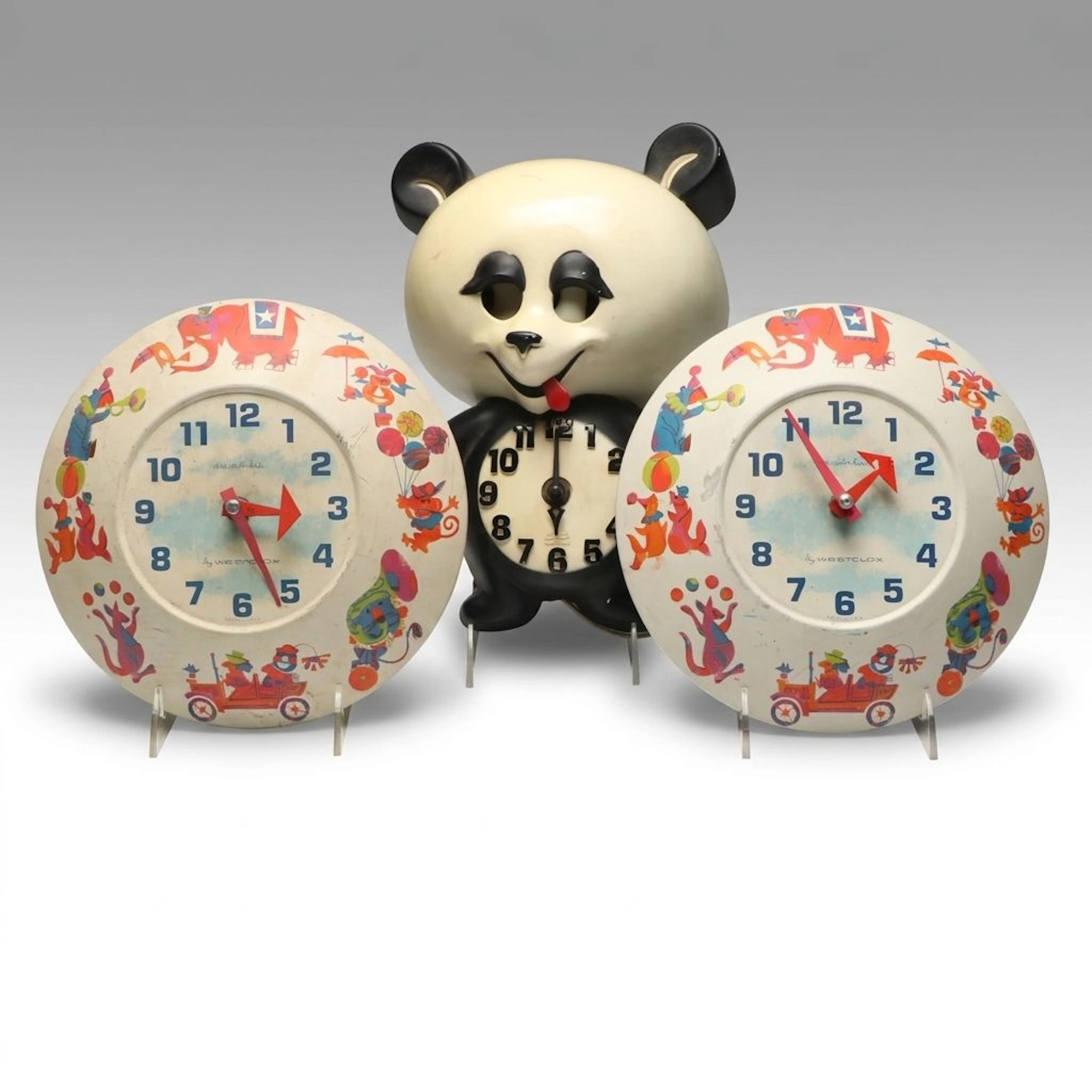 Vintage Westclox "Wee Winkie" and Spartus Novelty Wall Clocks