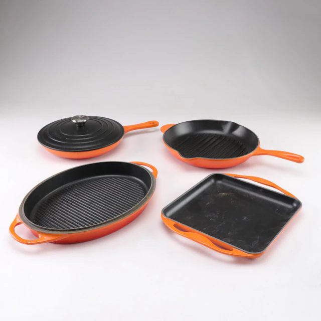 Le Creuset Enameled Cast Iron Griddles and Frying Pan with One Other Griddle