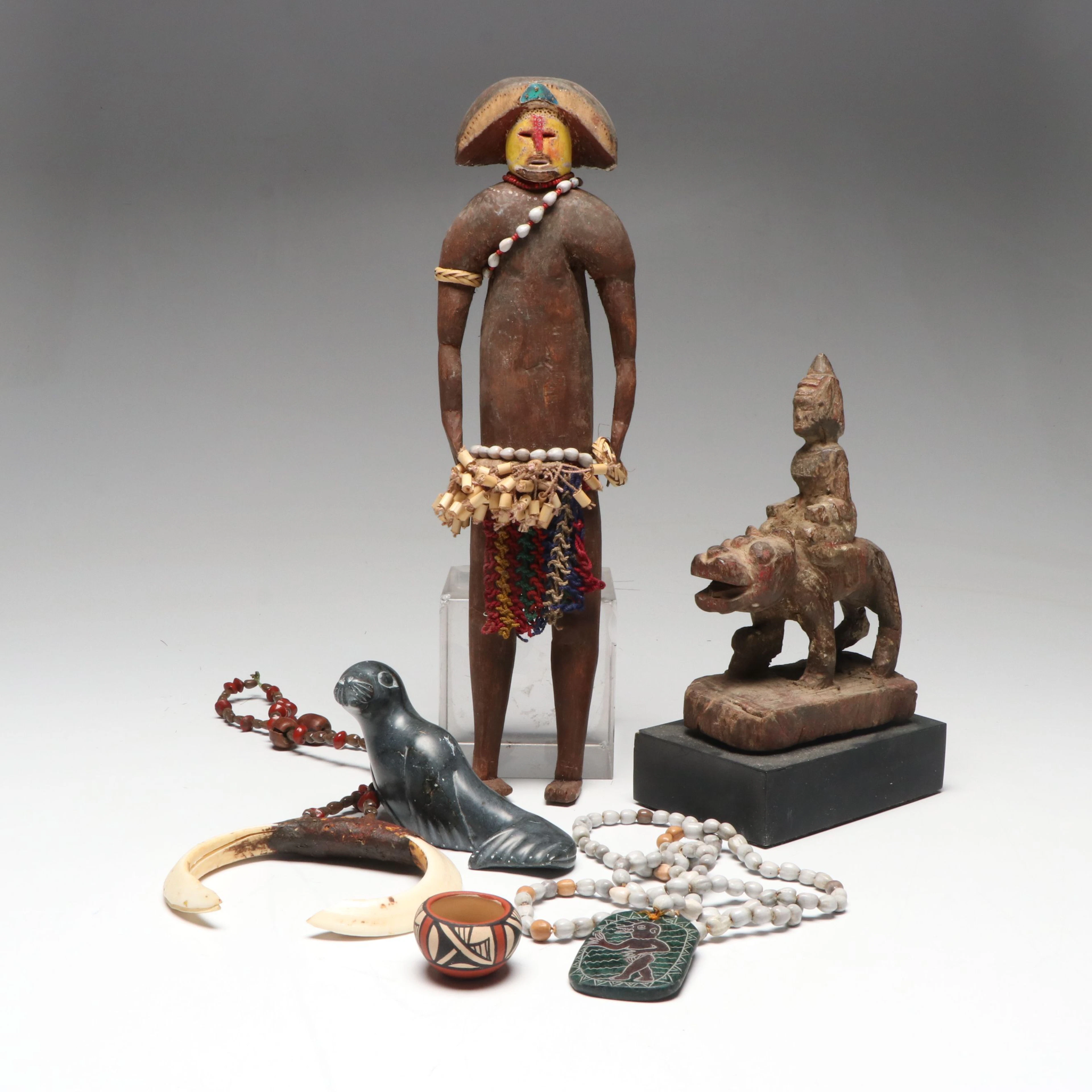 Asian, Melanesian and Southwestern Souvenirs with Boar Tusks, Jemez Pottery