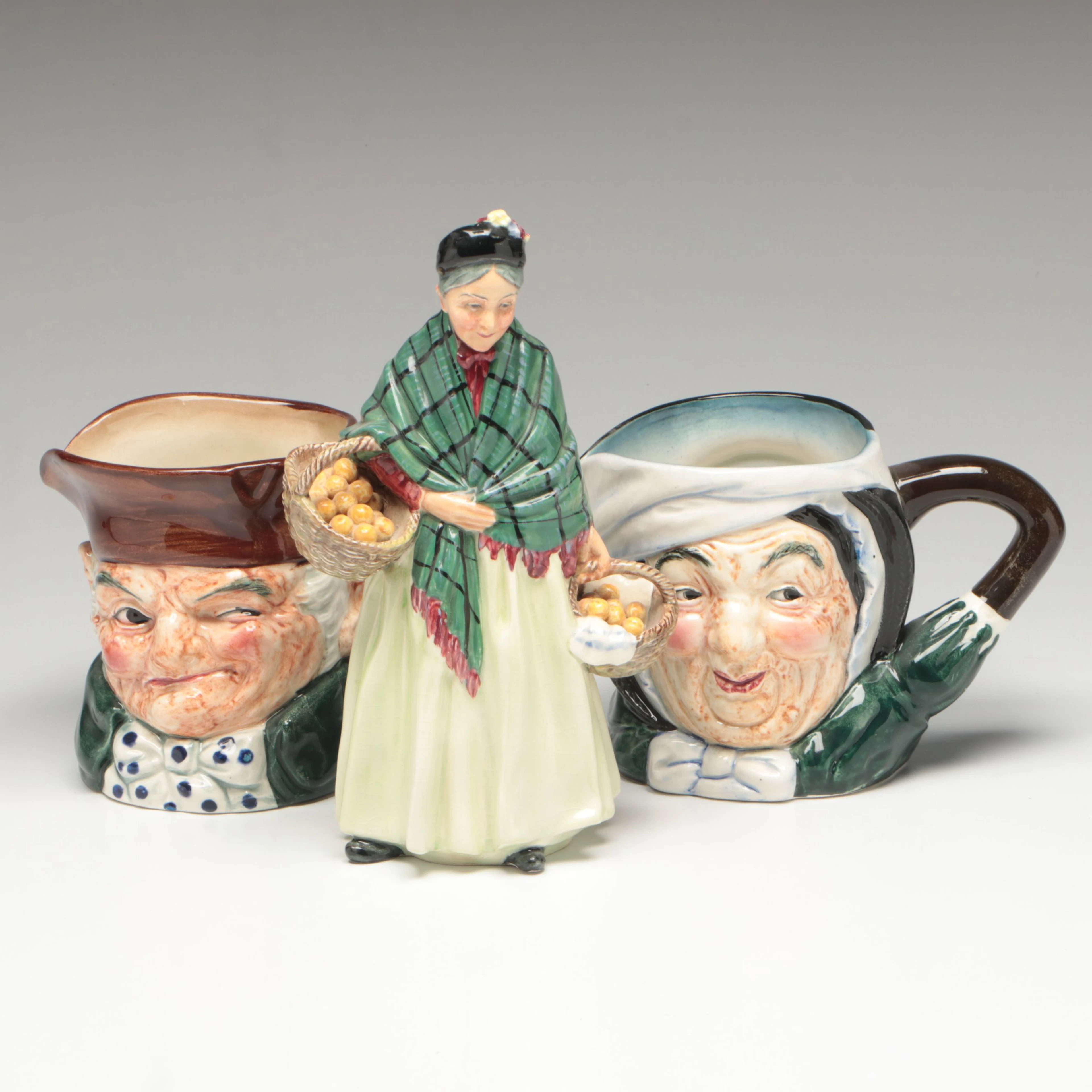 Royal Doulton "The Orange Lady" Bone China Figure with Ceramic Toby Jugs