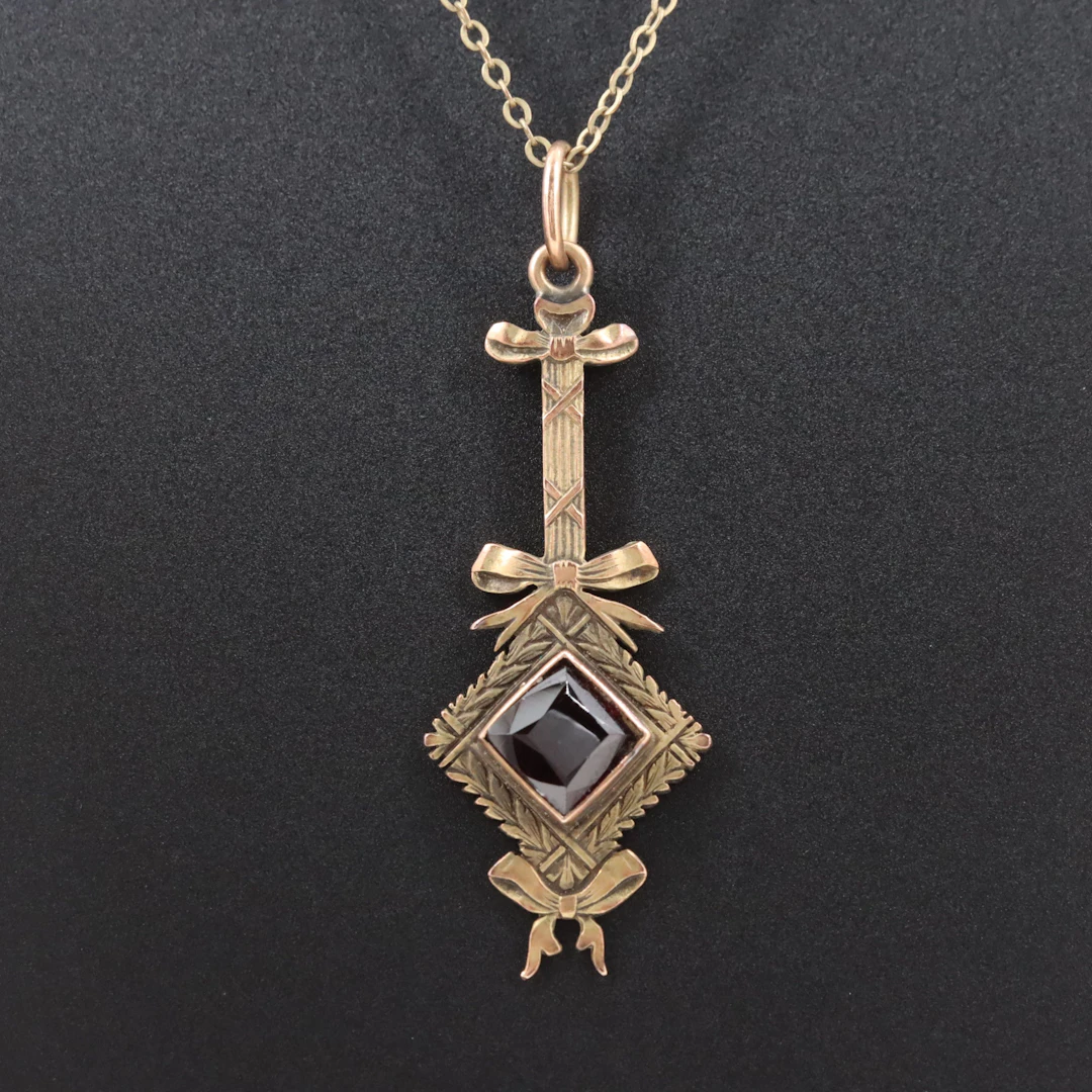 Antique 14K Garnet Bow and Garland Motif Pendant Necklace