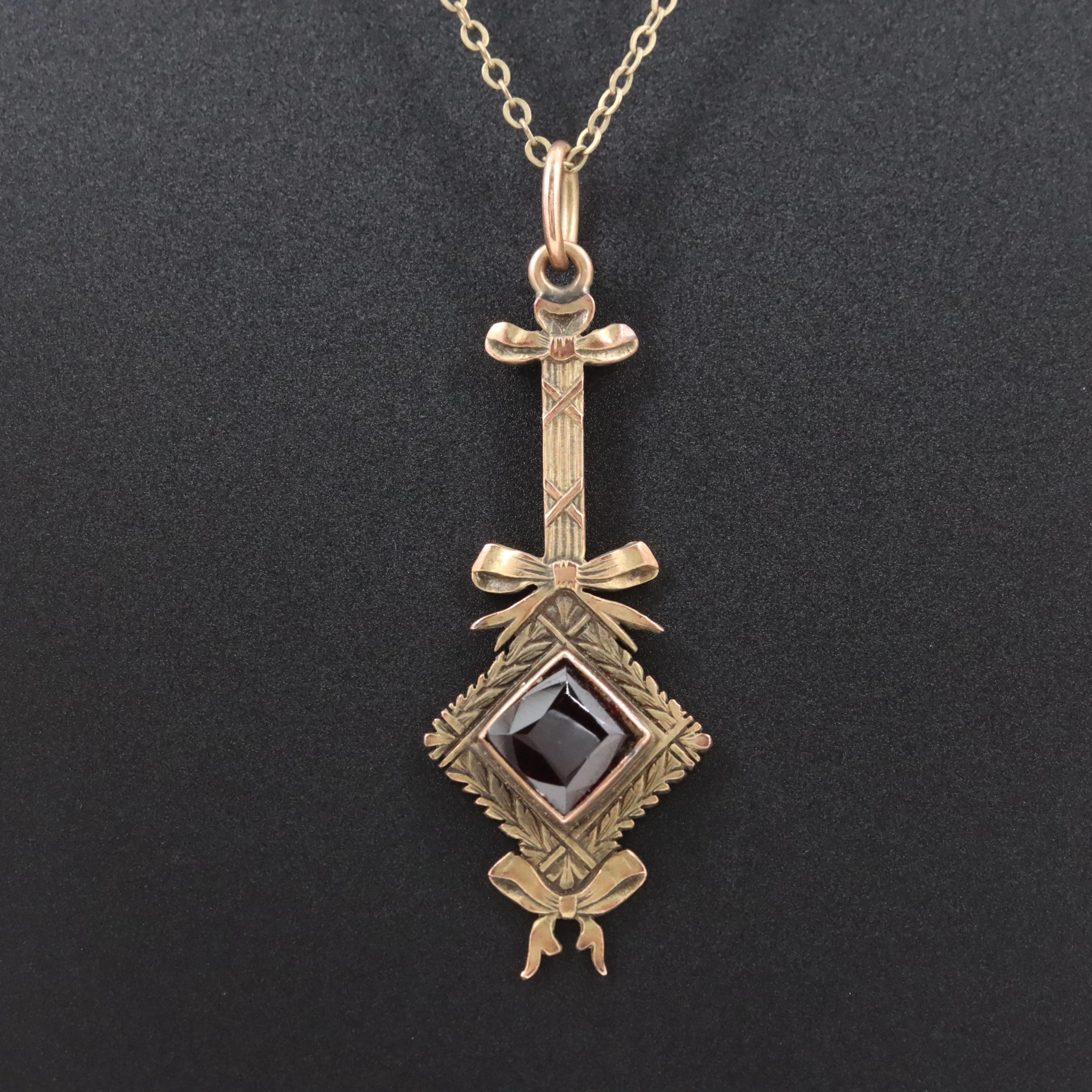 Antique 14K Garnet Bow and Garland Motif Pendant Necklace