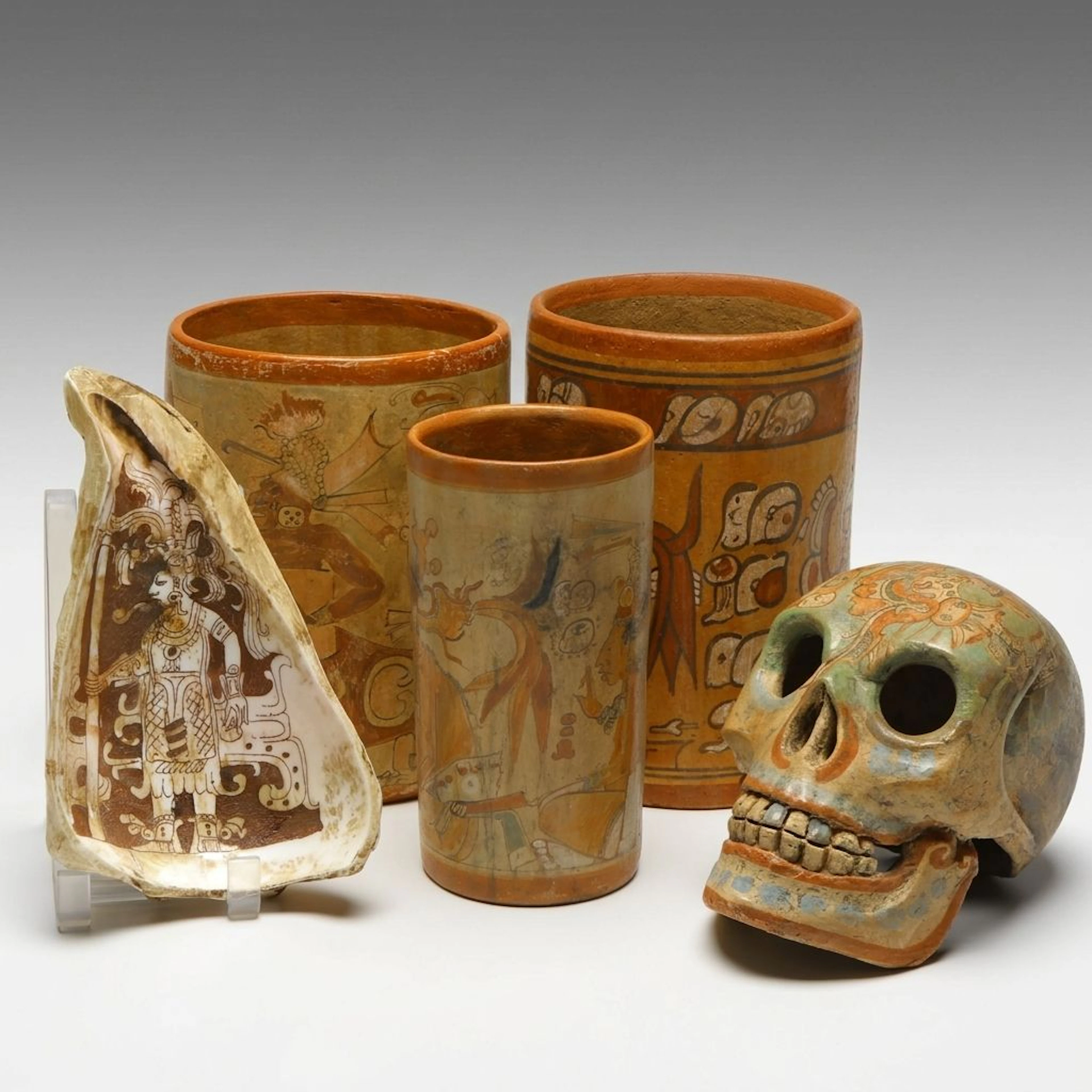 Pre-Columbian Style Cylindrical Pottery Vessels and Skull with Painted Shell