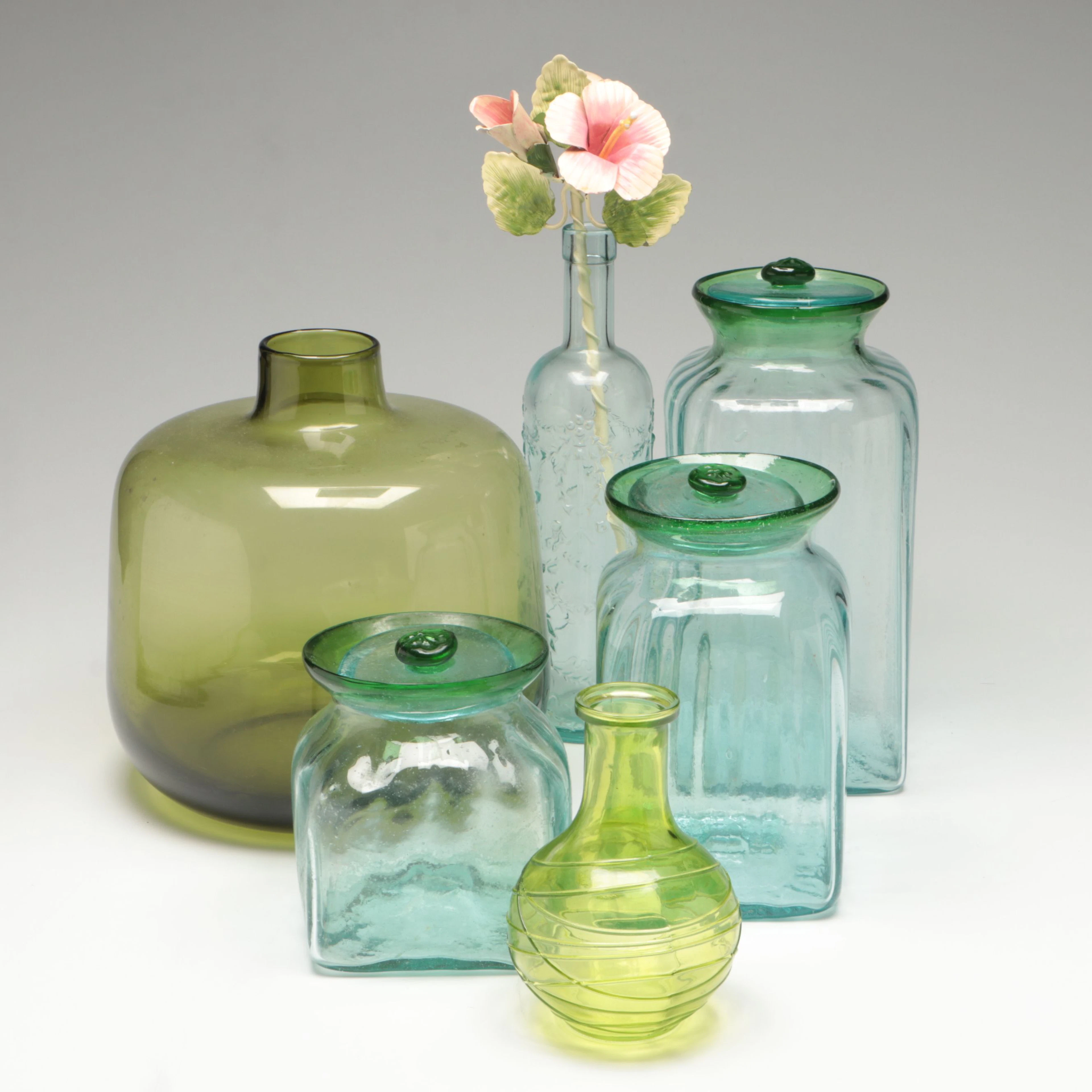 Green Demijohn Vase with Blown Glass Jars and More Décor