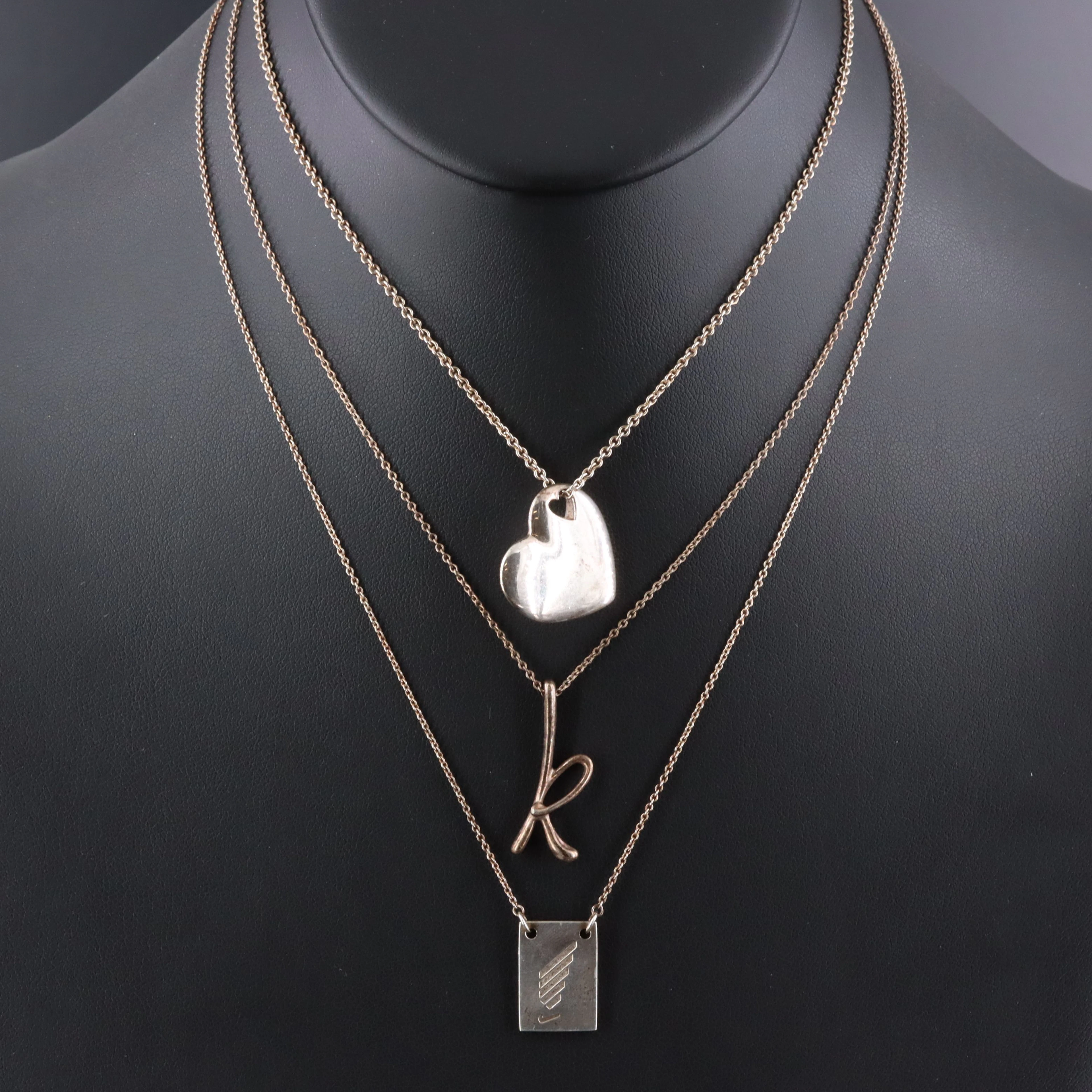 Tiffany & Co. Alphabet 'K', Nike Marathon, and Heart Stencil Necklaces