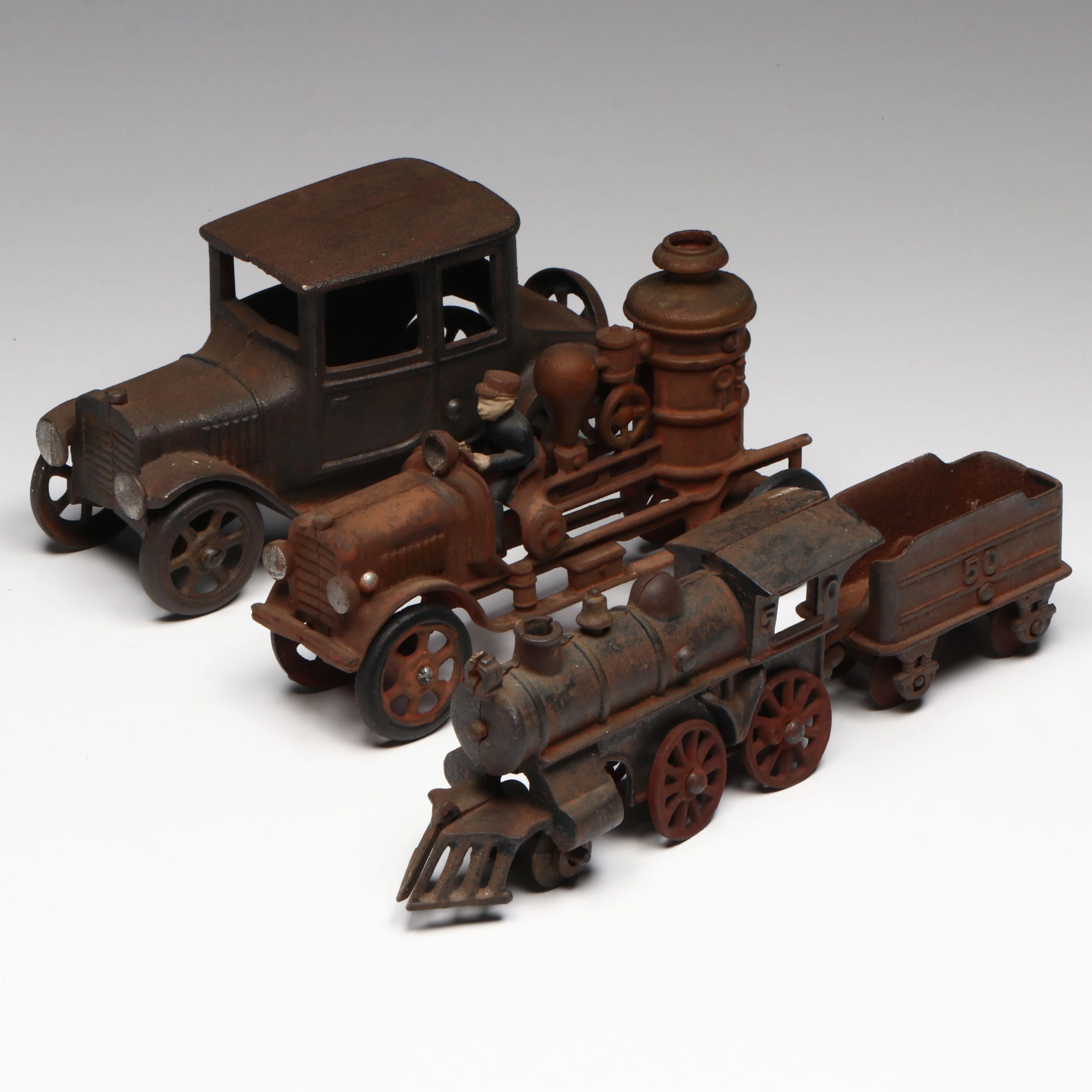 Rustic Ford Model T, Fire Engine and Steam Locomotive Cast Iron Toys, Vintage