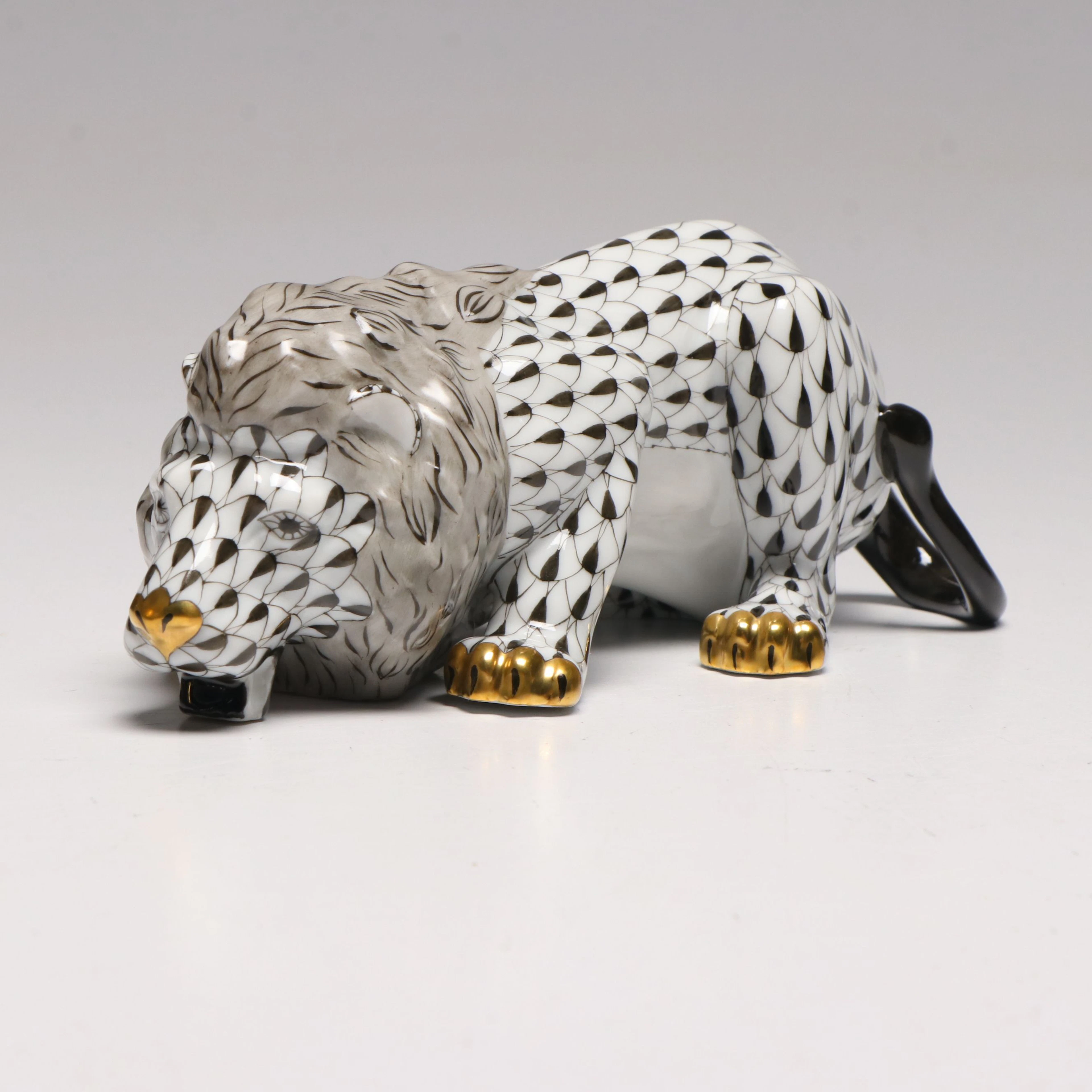 Herend Black Fishnet with Gold "Drinking Lion" Porcelain Figurine