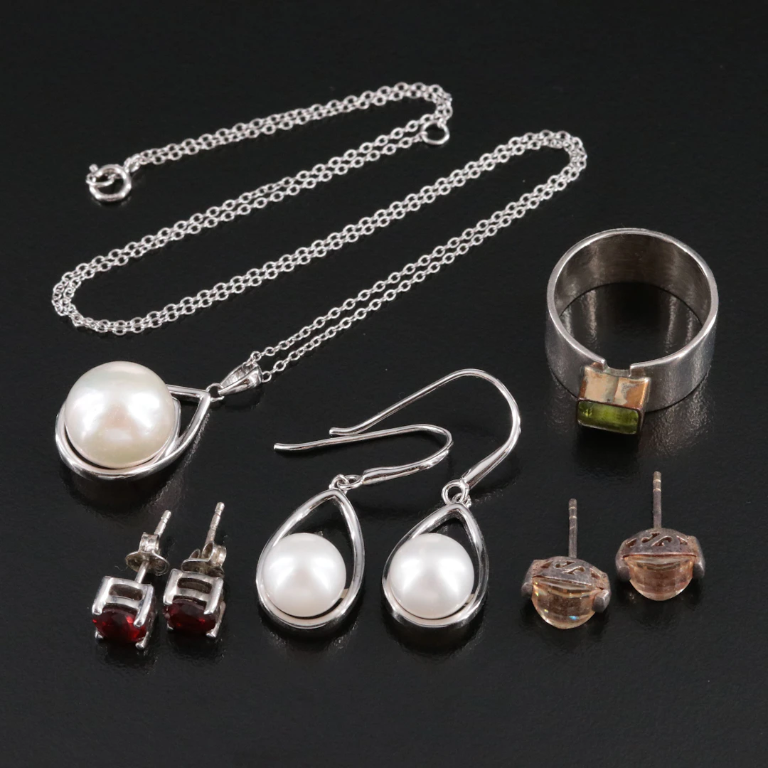 Juan Willie Navajo Diné Peridot and Pearl Featured in Sterling Jewelry