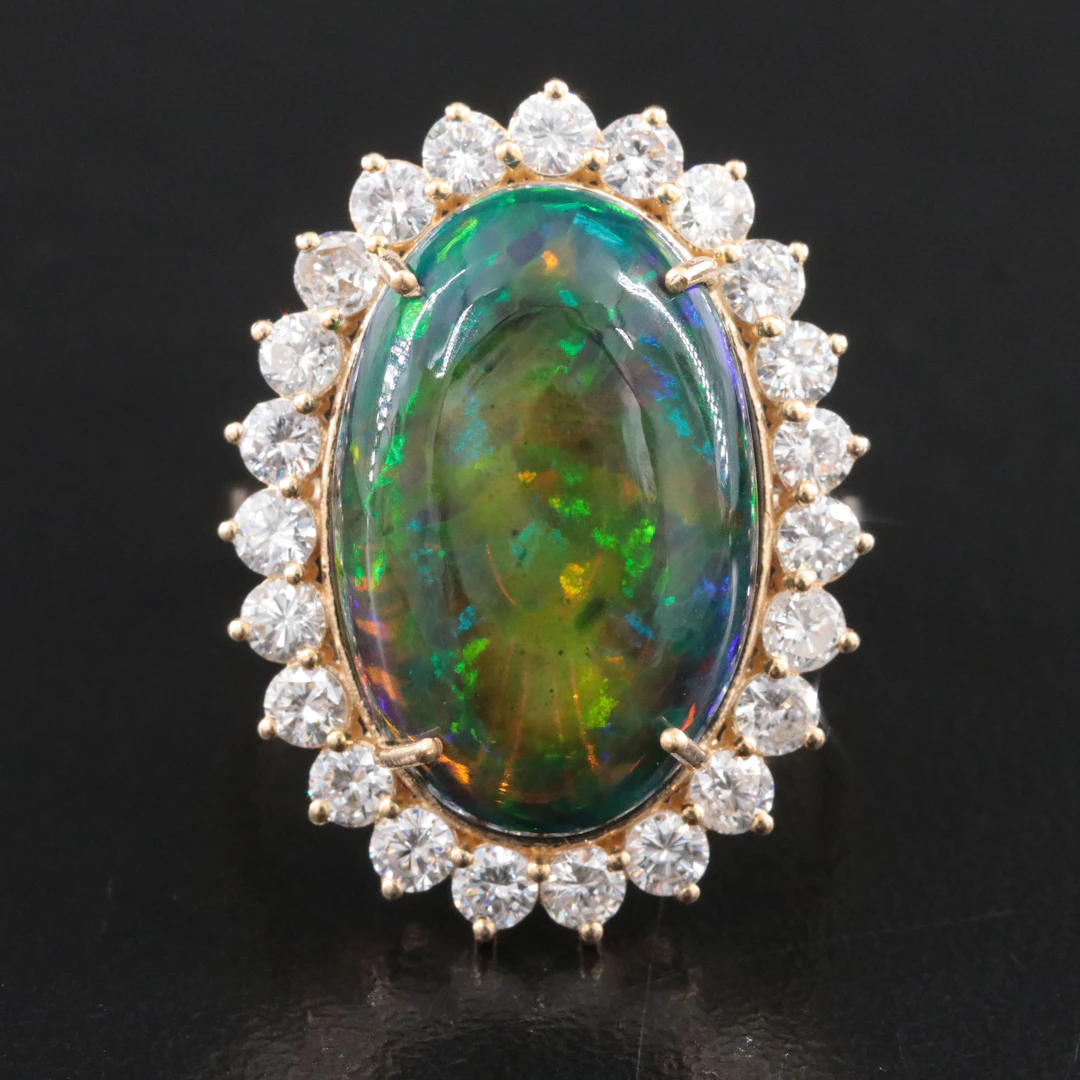 14K 8.22 CT Opal and 1.37 CTW Diamond Ring