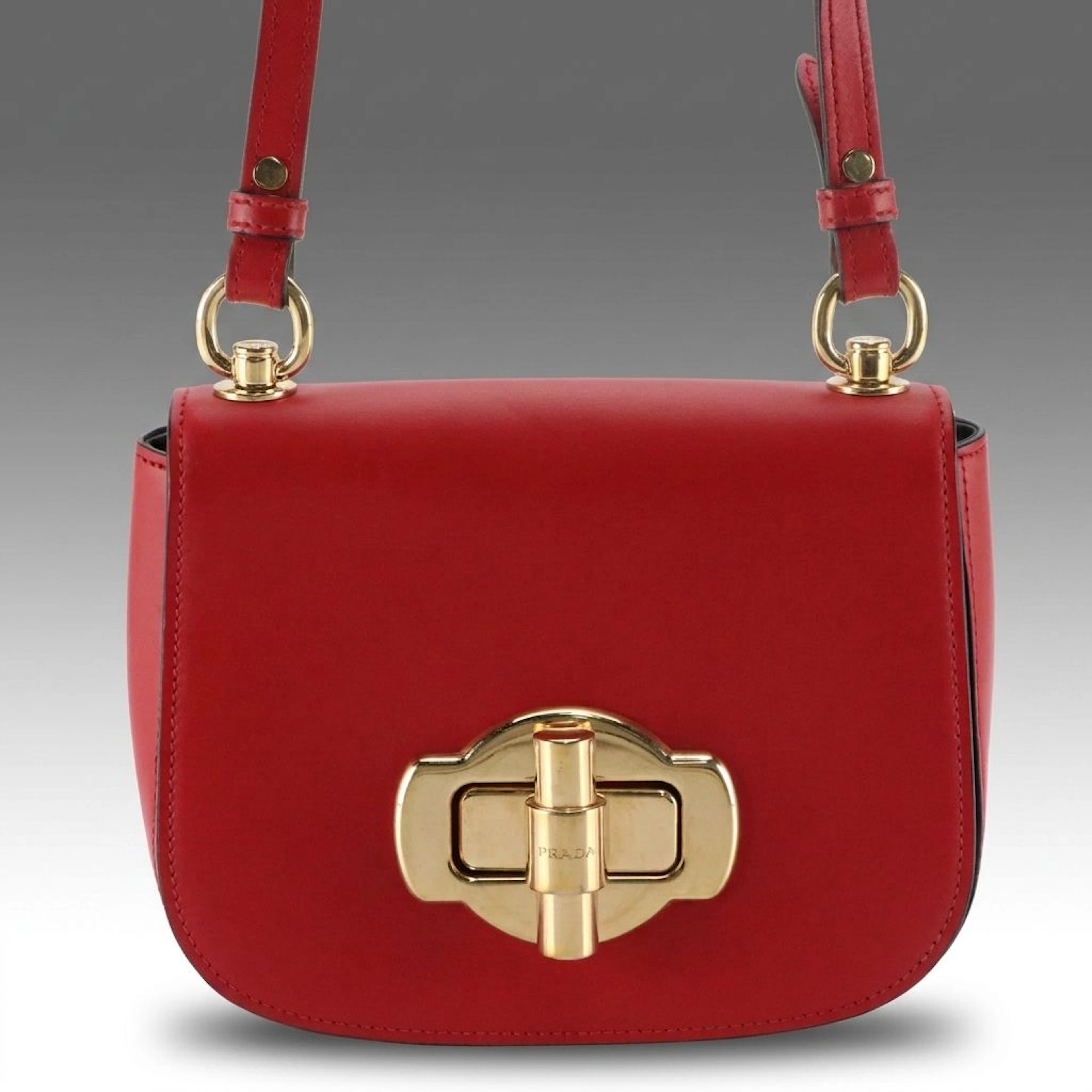 Prada Turnlock Saddle Crossbody Bag in Red Calfskin Leather