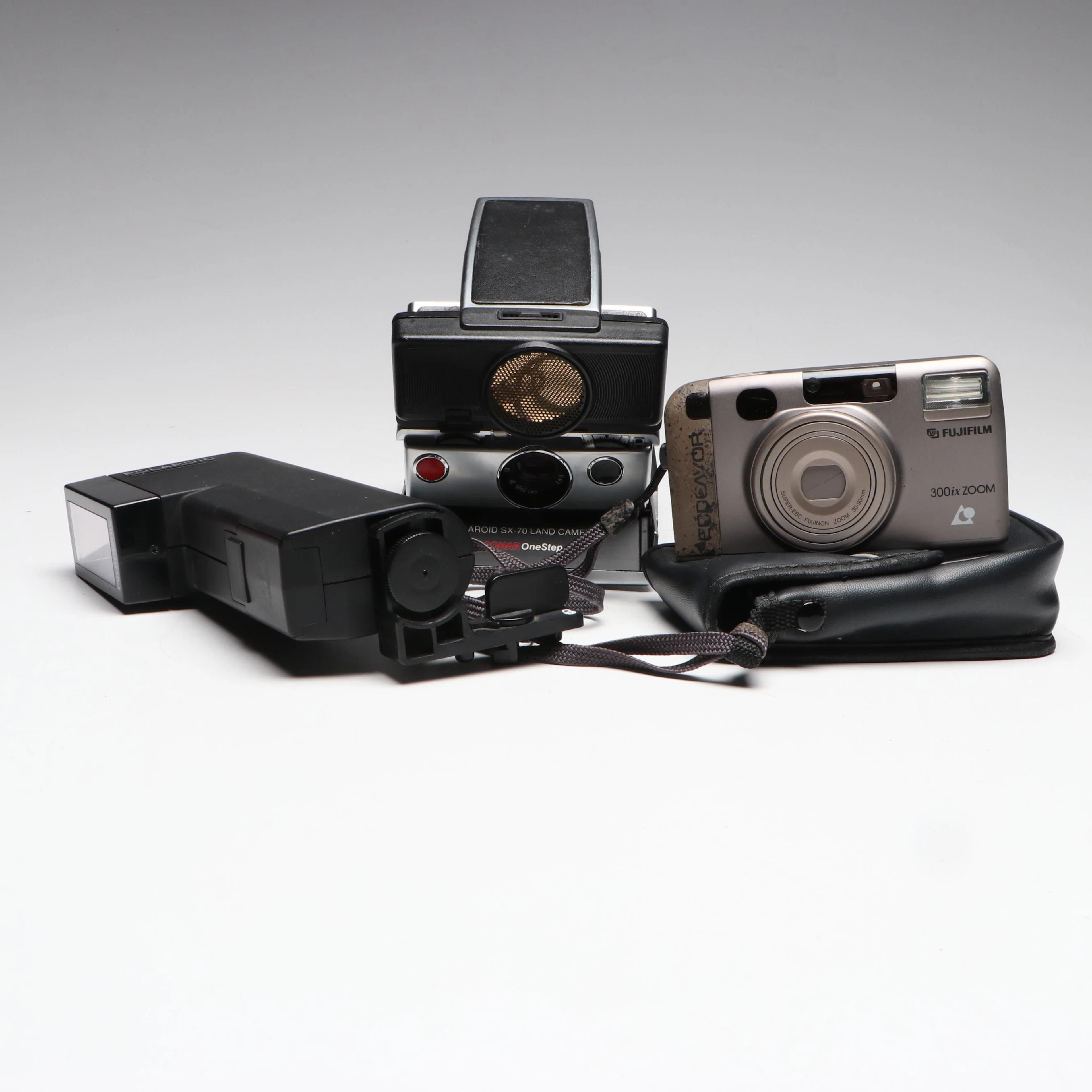 Polaroid SX-70 Sonar OneStep SLR with Flash and Fujifilm 300ix Zoom