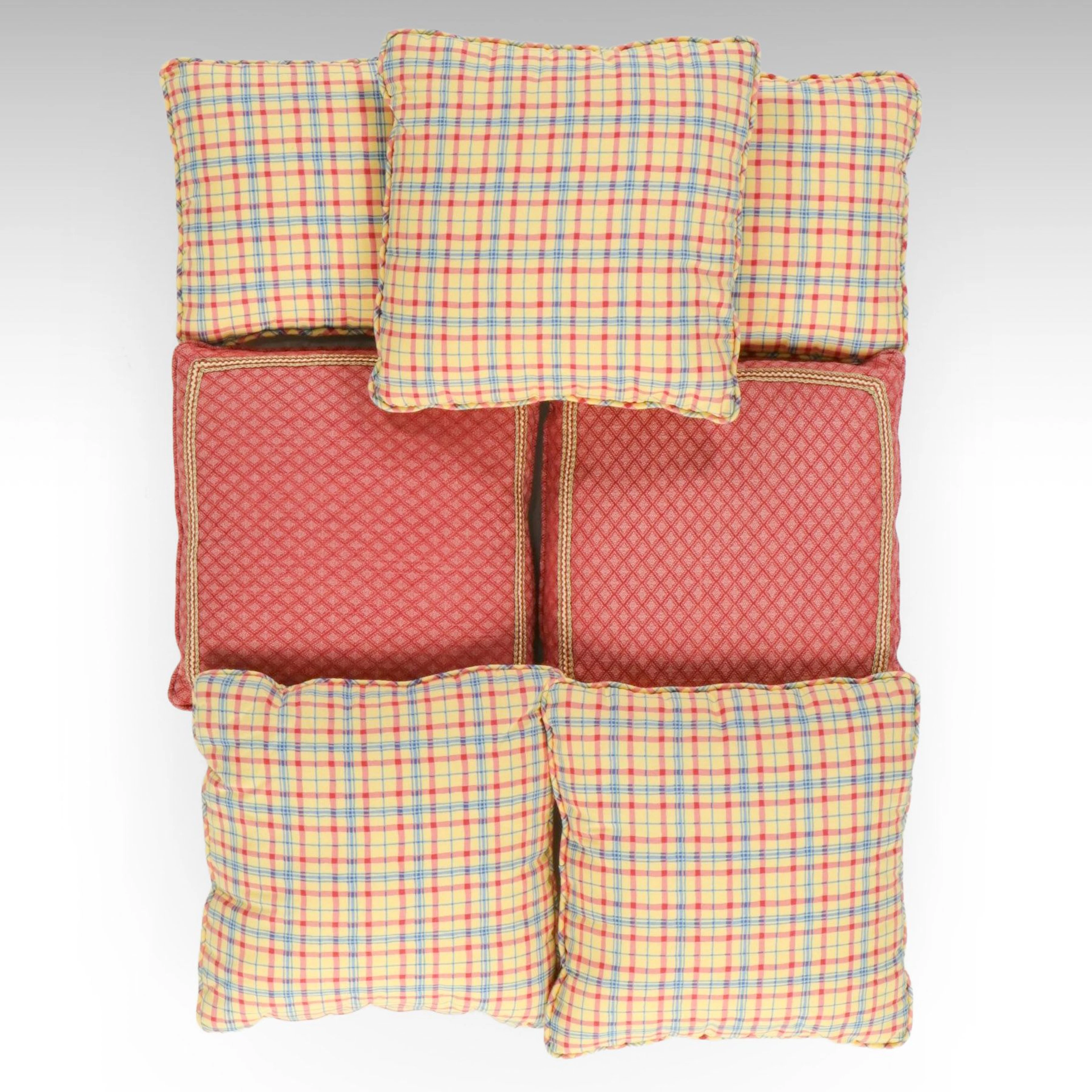 Two Diamond Pattern Pillows with Five Plaid Patterned Accent Pillows