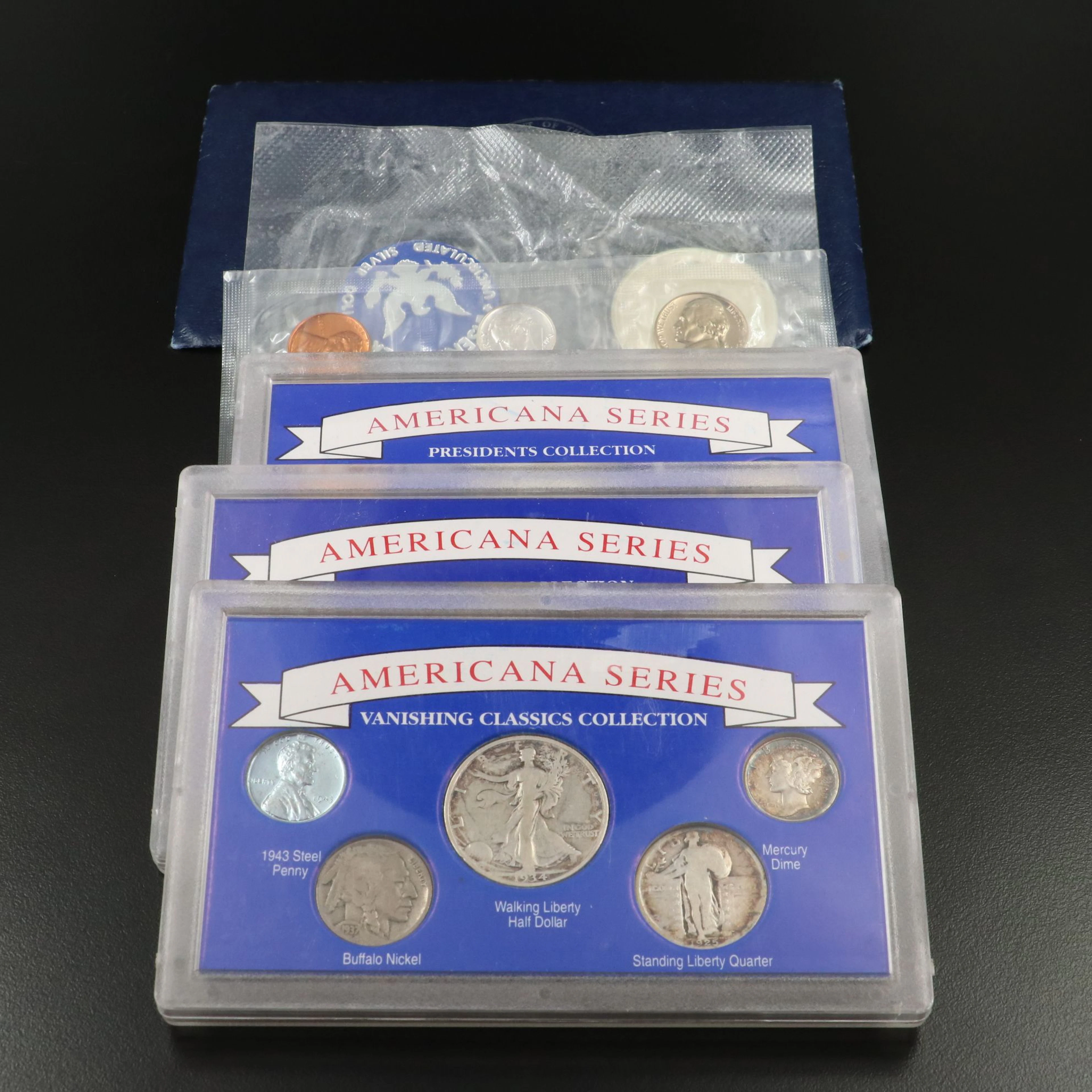 Four U.S. Silver Coin Sets and Two Silver Eisenhower Dollars