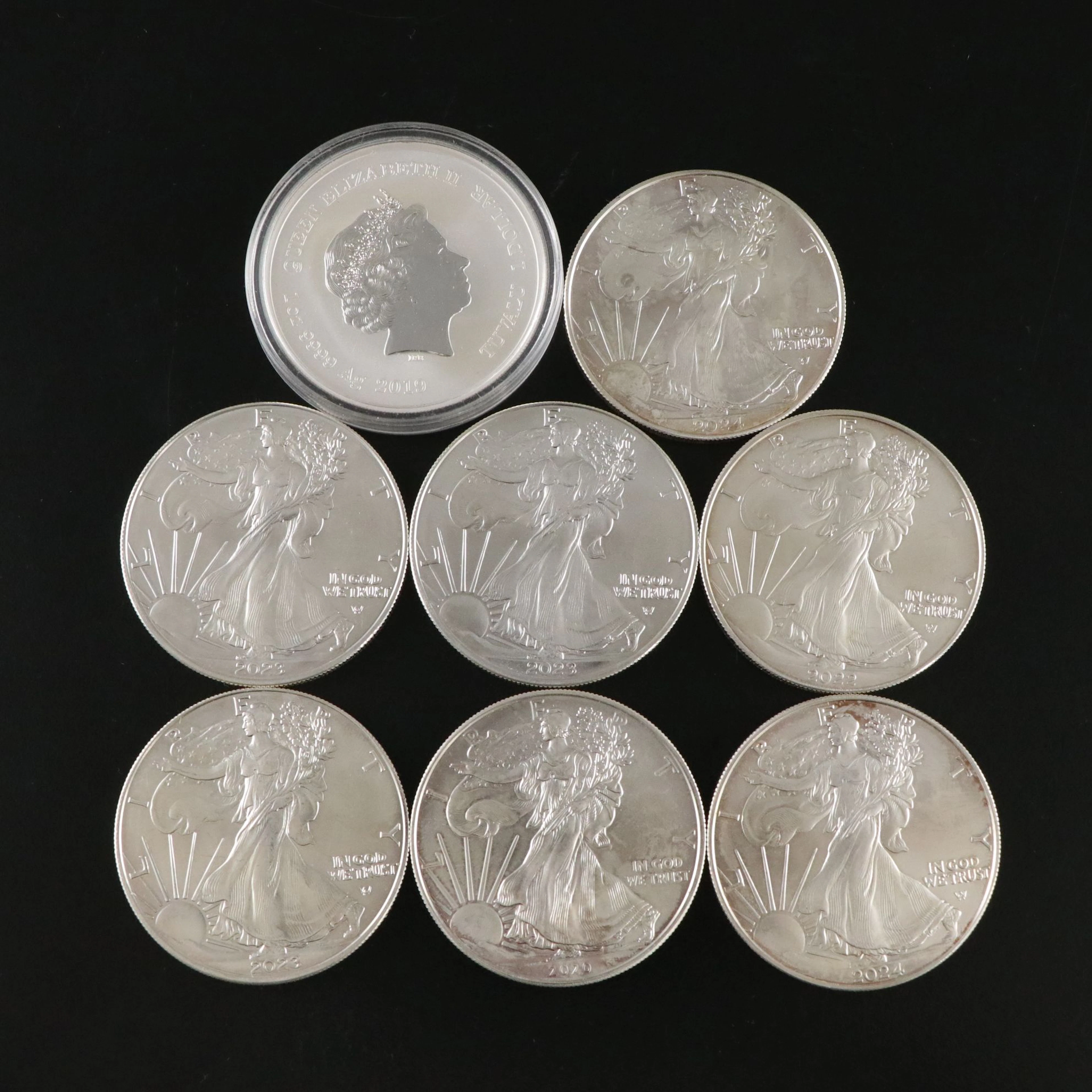 Seven Silver Eagle and One 2019 Tuvalu 1-Oz. Bullion Coins