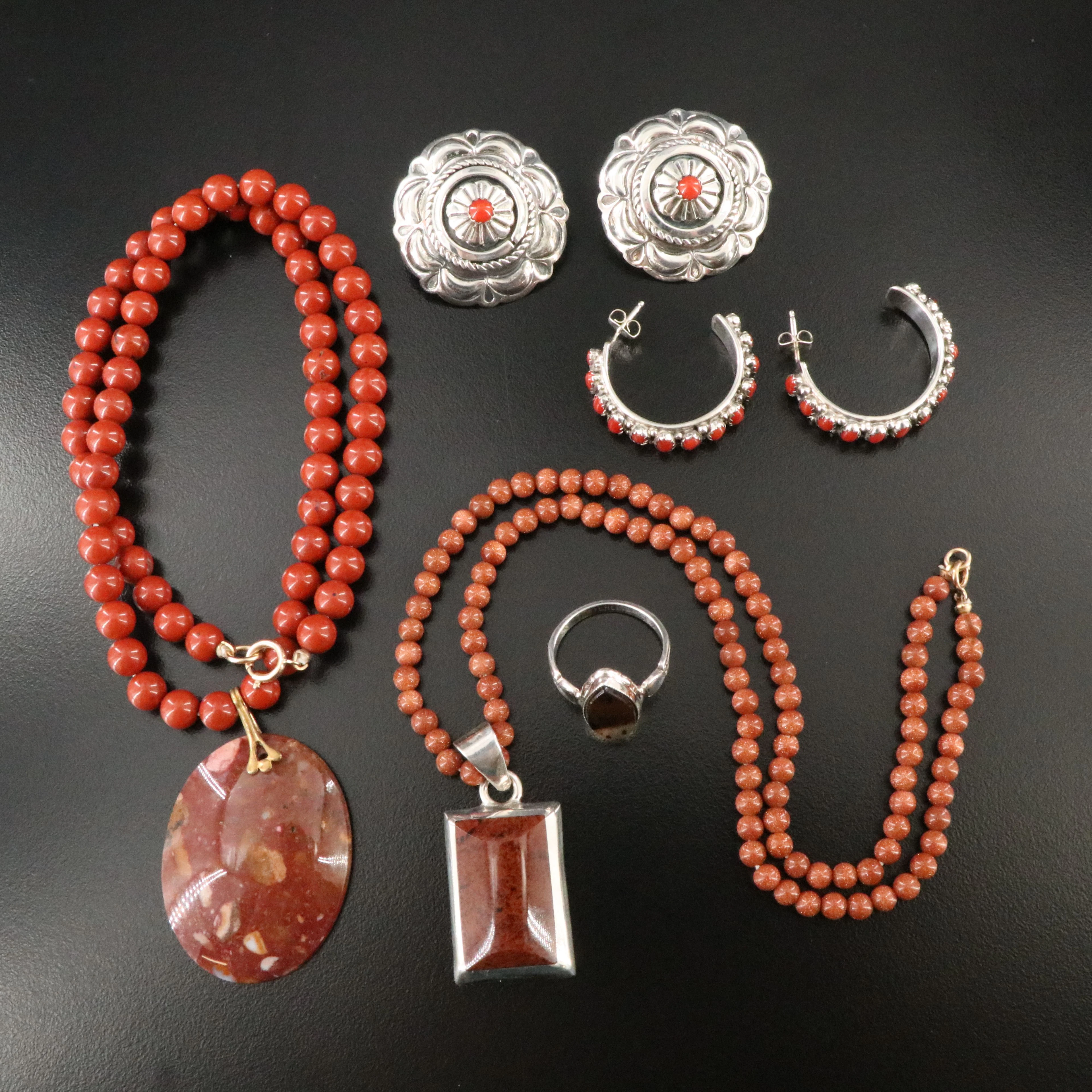 Sterling, Coral, Jasper and Goldstone Featured in Jewelry