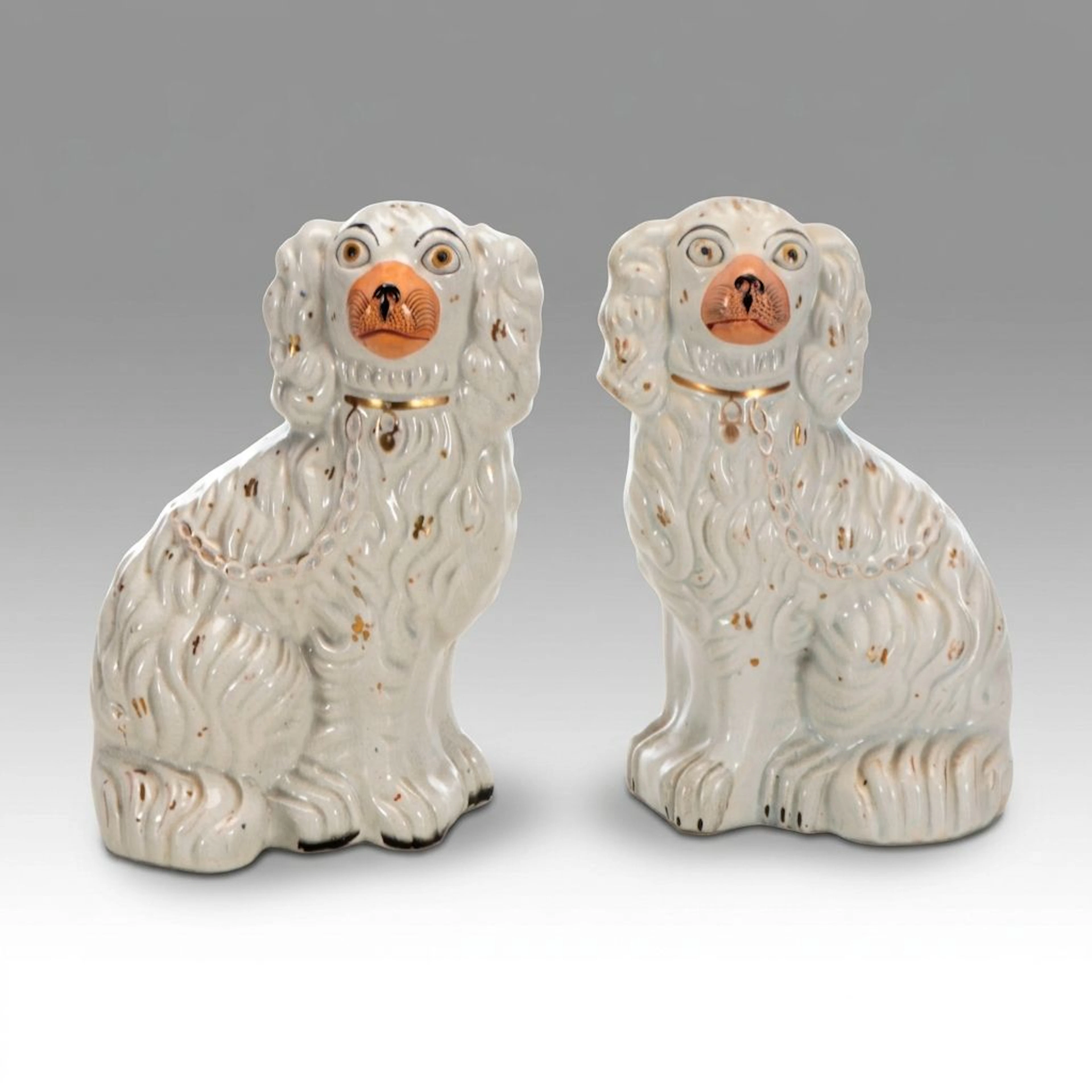 Pair of Staffordshire Style Ceramic Spaniel Figurines