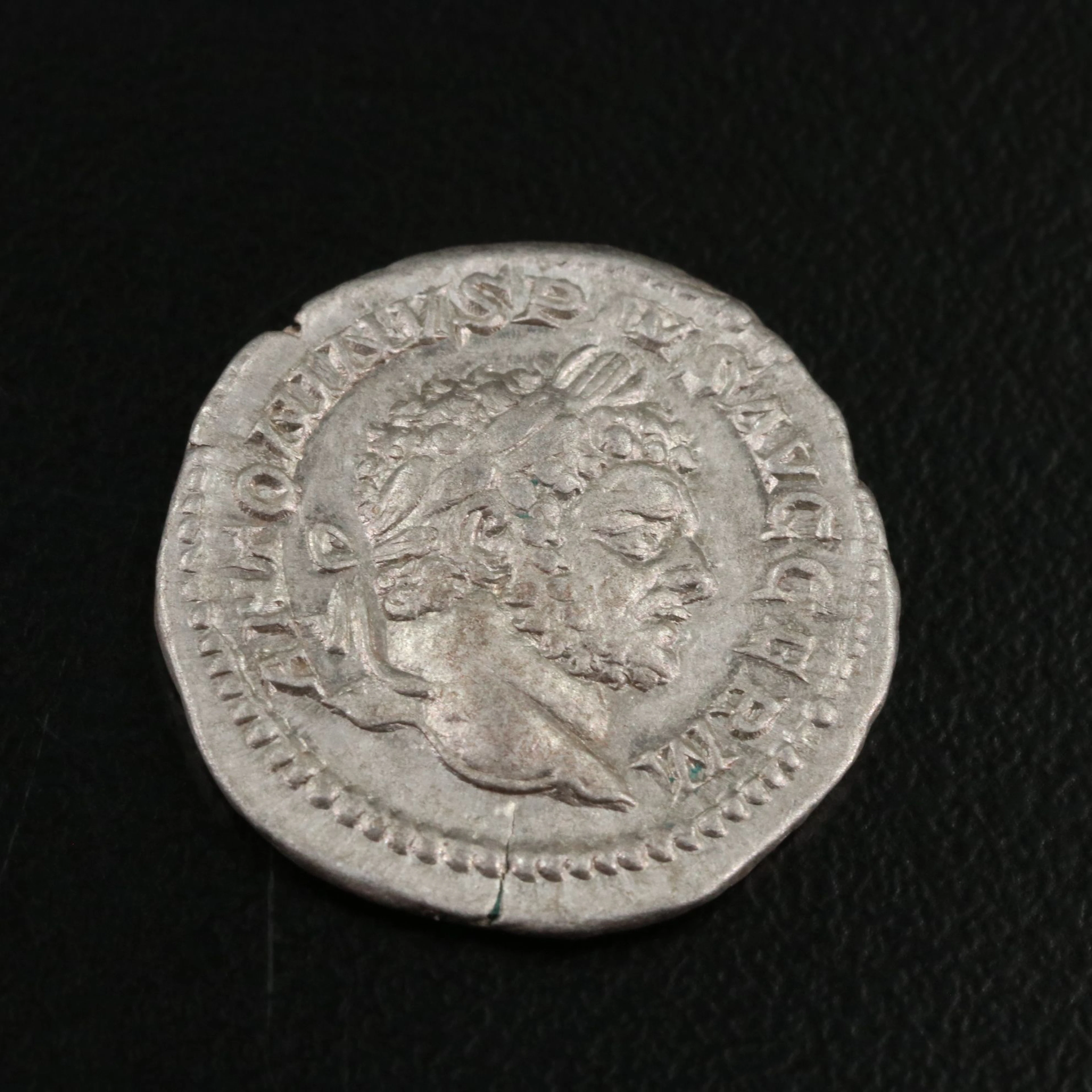 Ancient Roman Imperial AR Denarius Coin of Caracalla, ca. 206 A.D.