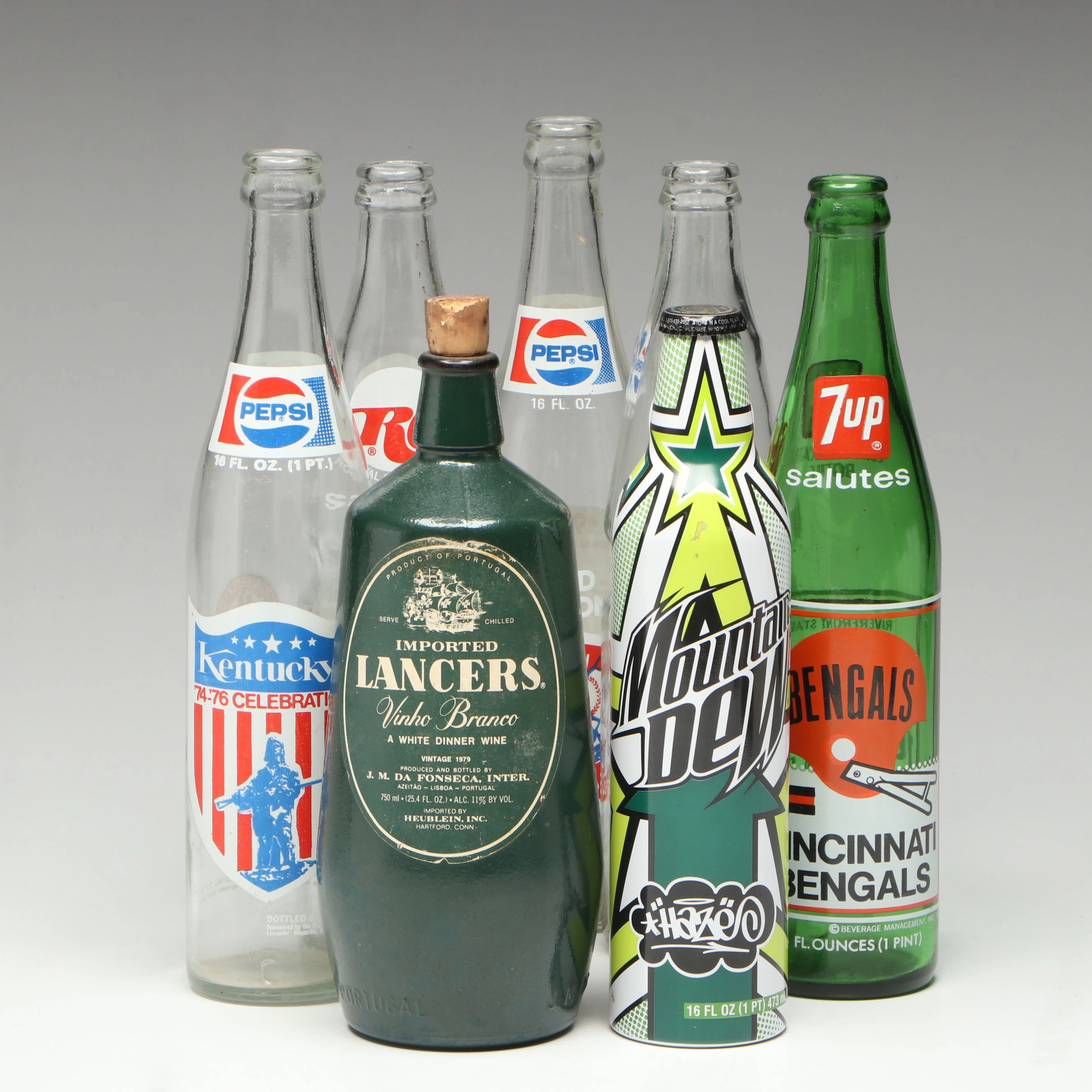 Commemorative Bottles Including Pepsi, RC, 7up and More