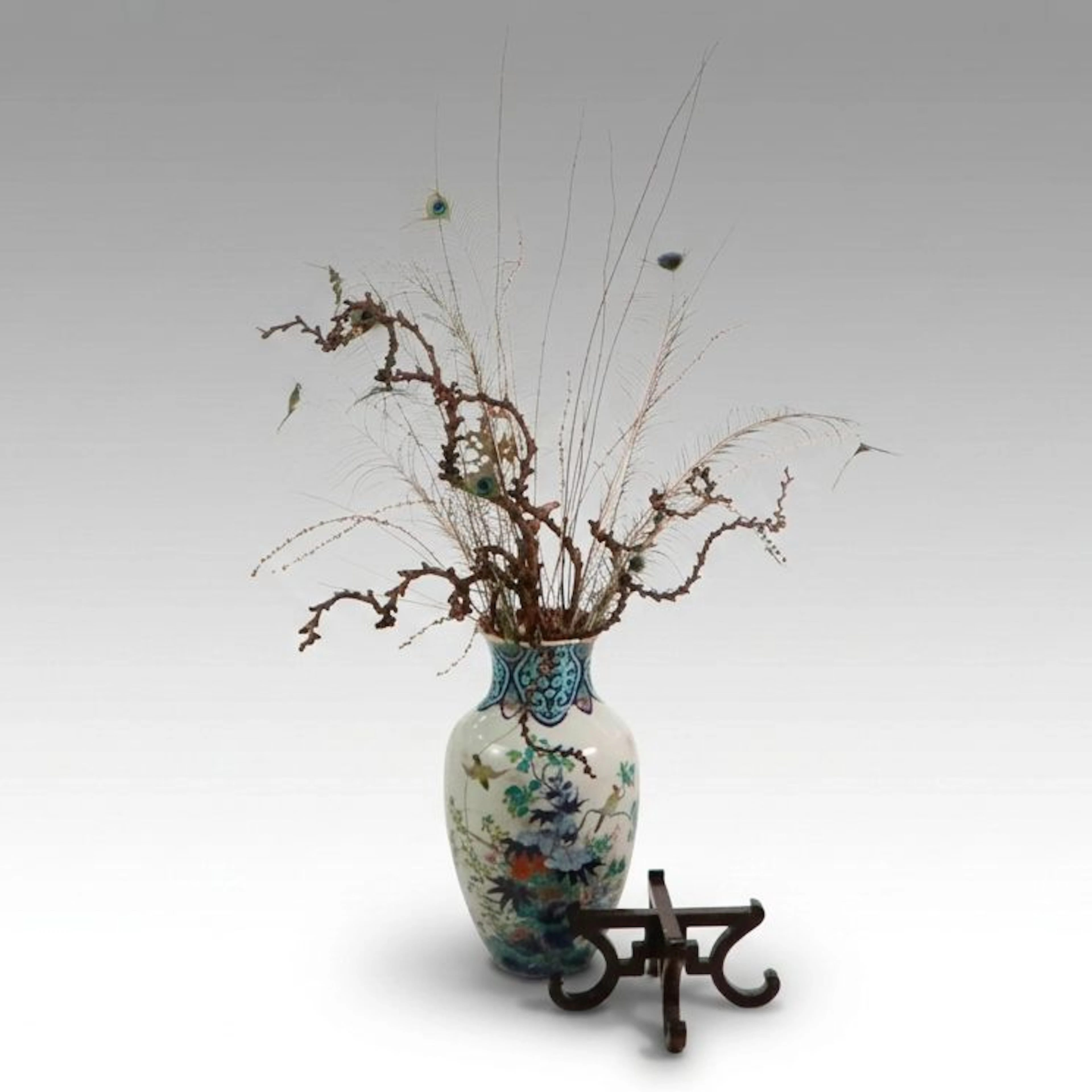 Chinese Porcelain Vase with Peacock Feather and Dried Branch Decor