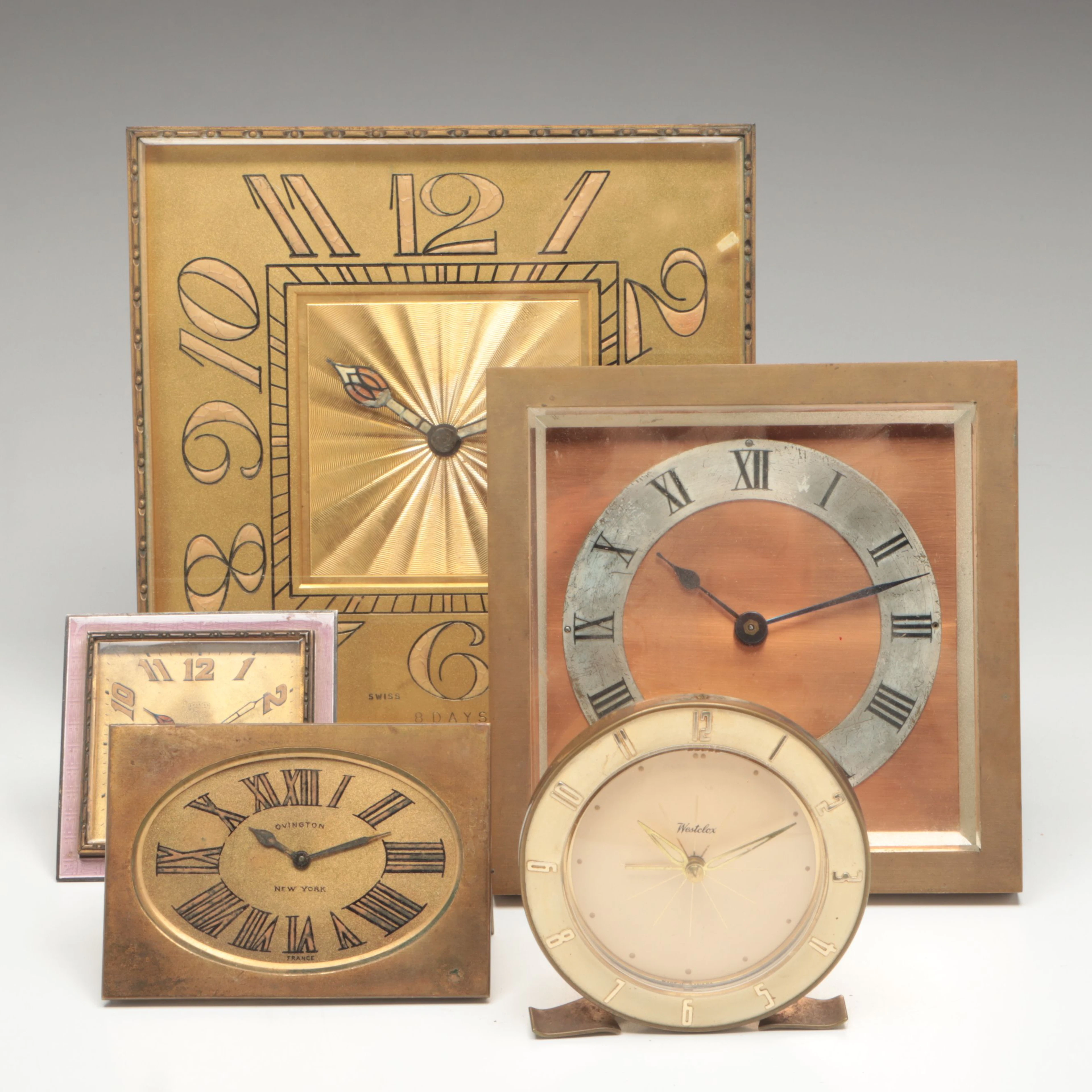 Swiss Guilloché Enamel Travel Clock with Ovington and More Metal Clocks
