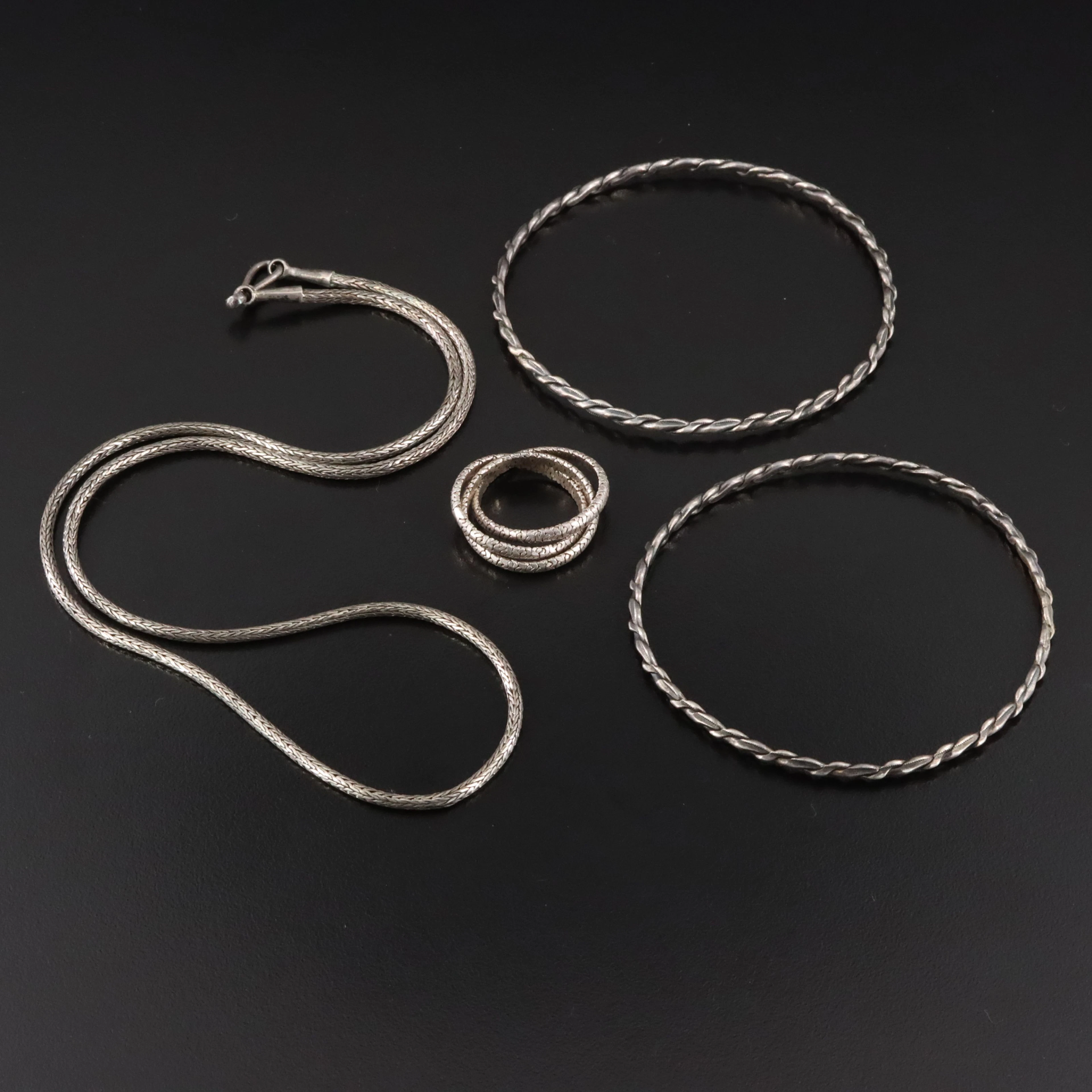 Sterling Necklace, Braided Bracelets and Rolling Ring