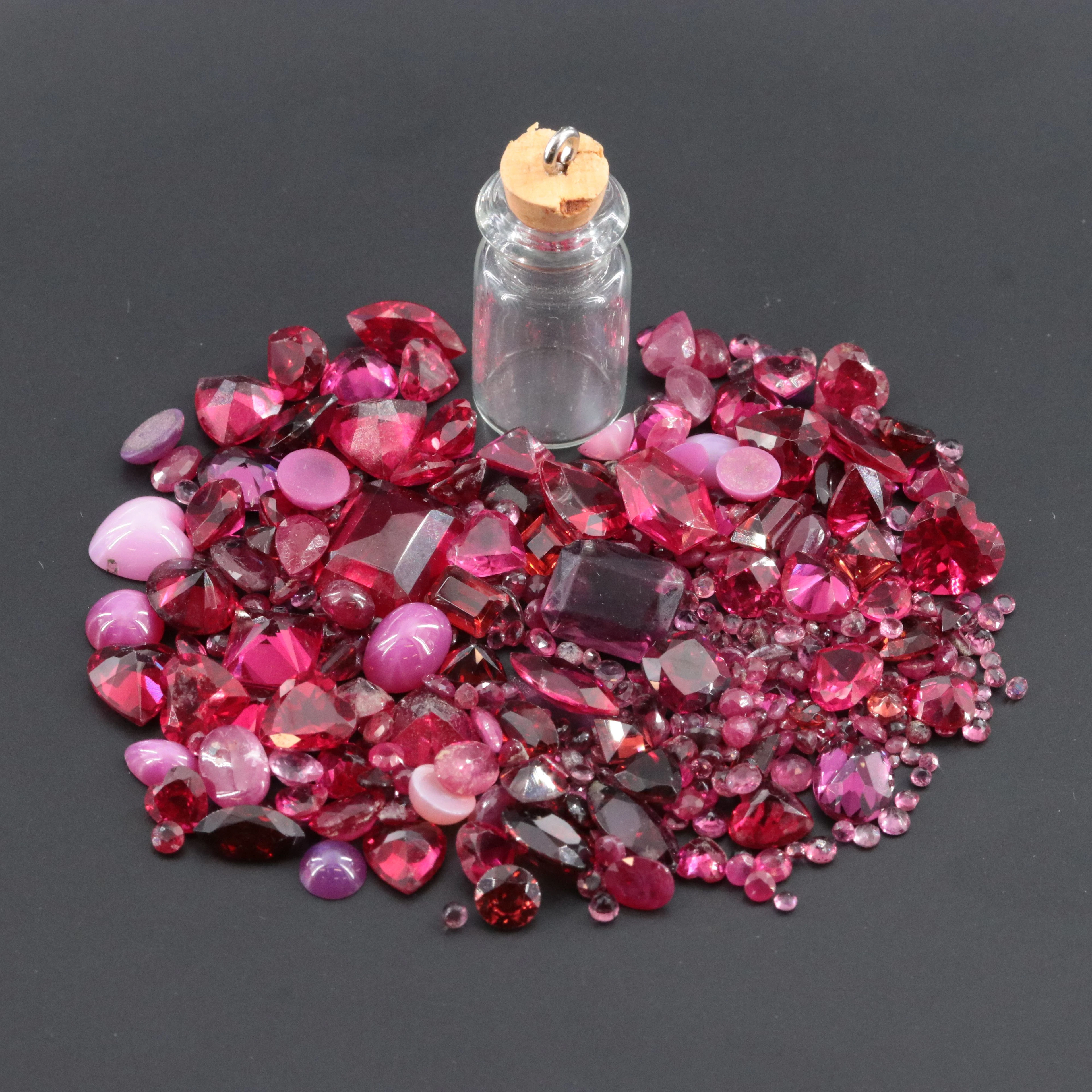 Loose 117.03 CTW Ruby and Lab Grown Ruby with Glass Stopper Bottle