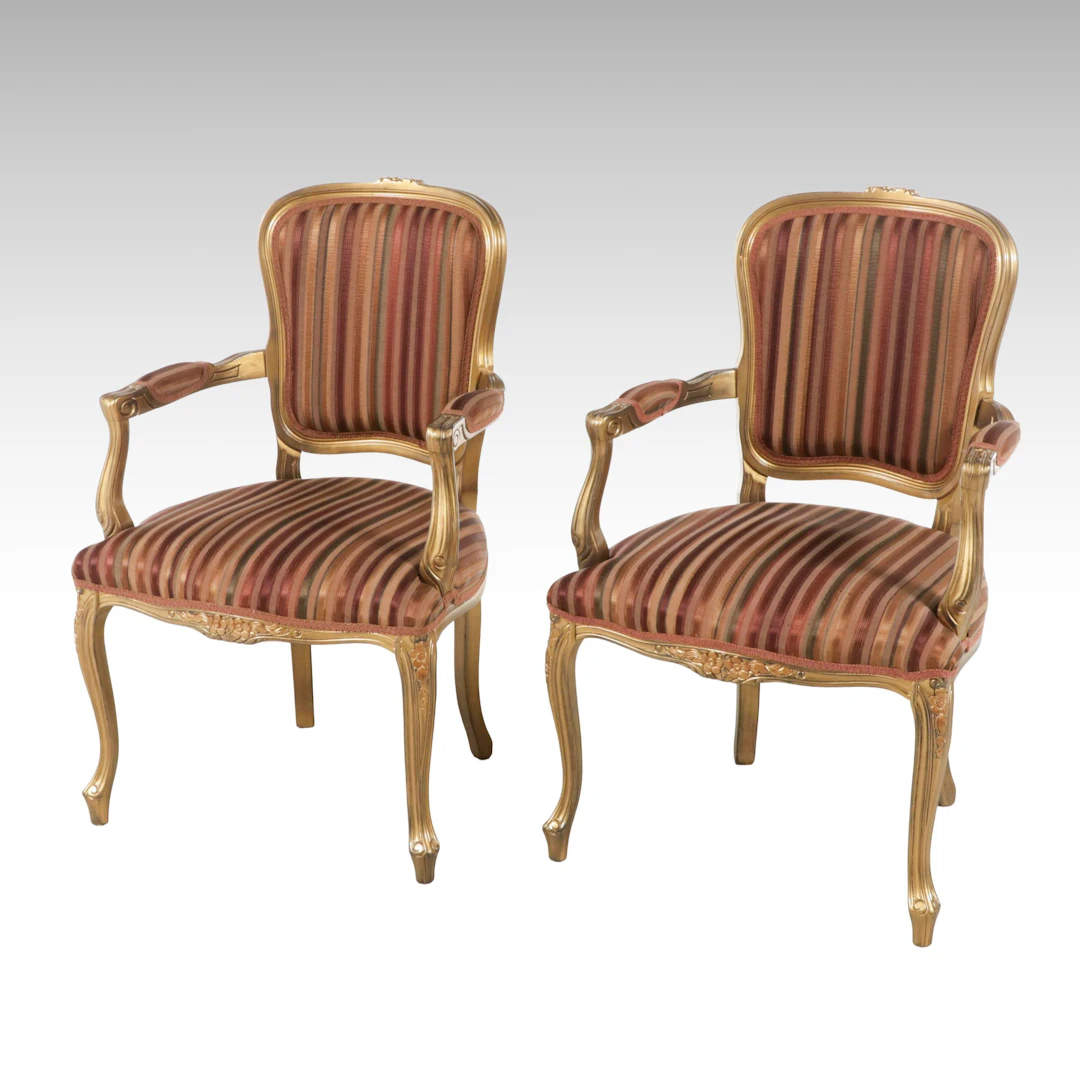 Pair of Louis XVI Style Upholstered Giltwood Armchairs, Late 20th to 21st C.