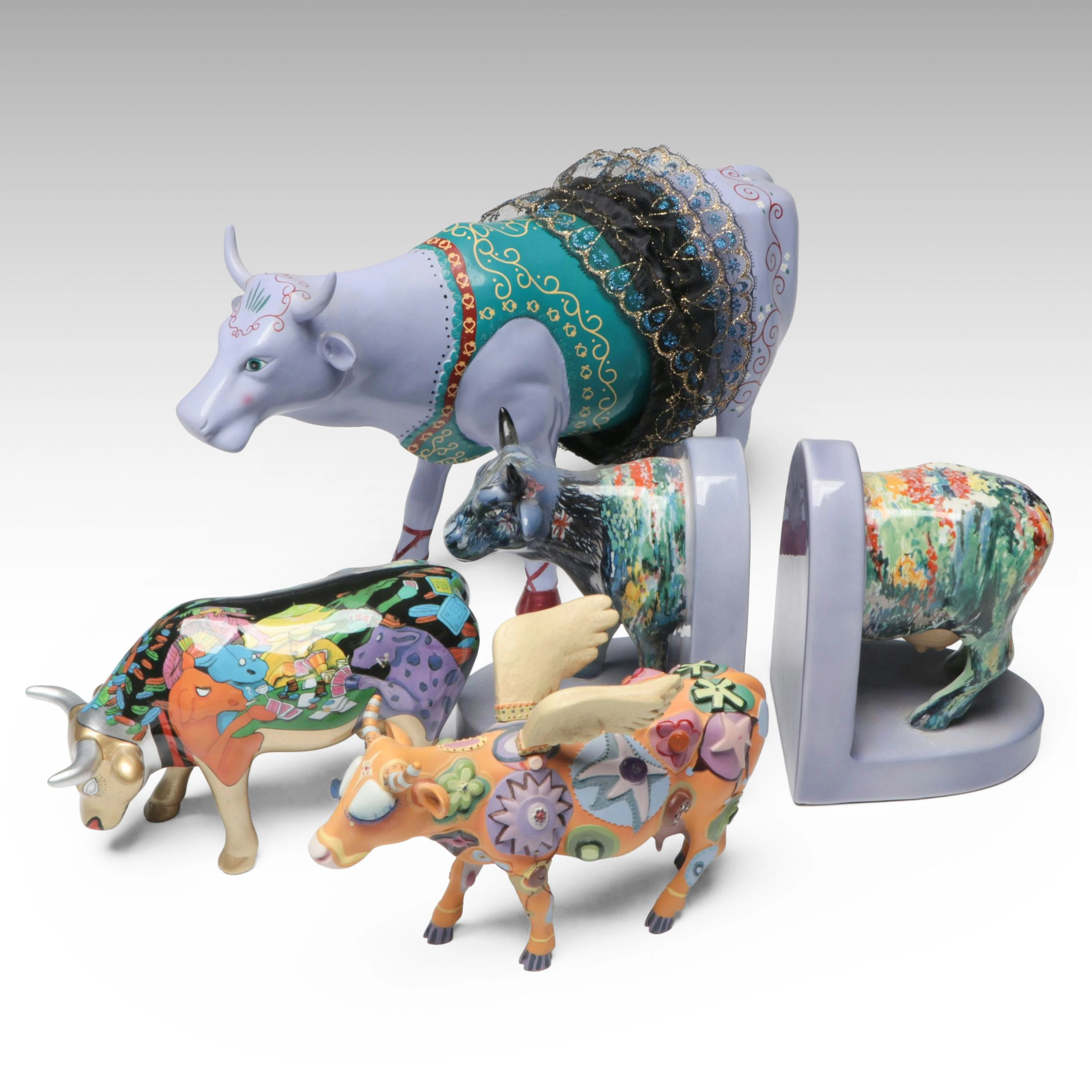 CowParade "Moonet" Ceramic Bookends with More Cow Figurines