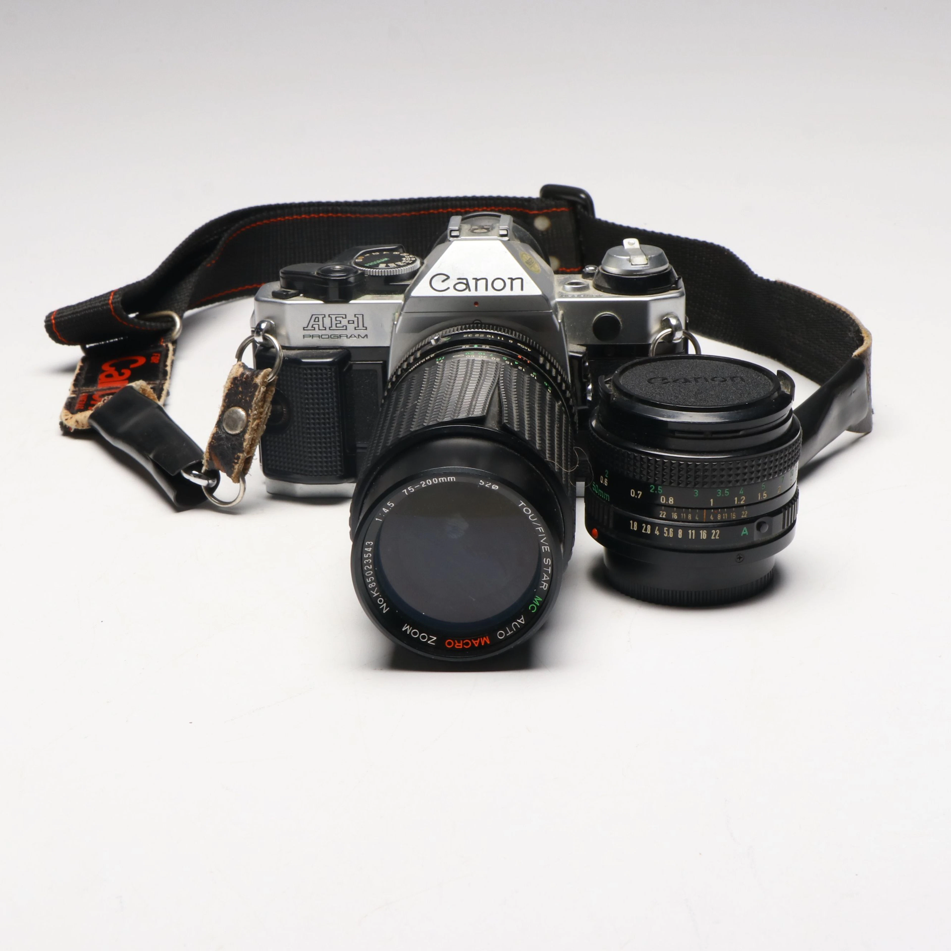 Canon AE-1 35mm SLR Film Camera and Lenses, Late 20th C.