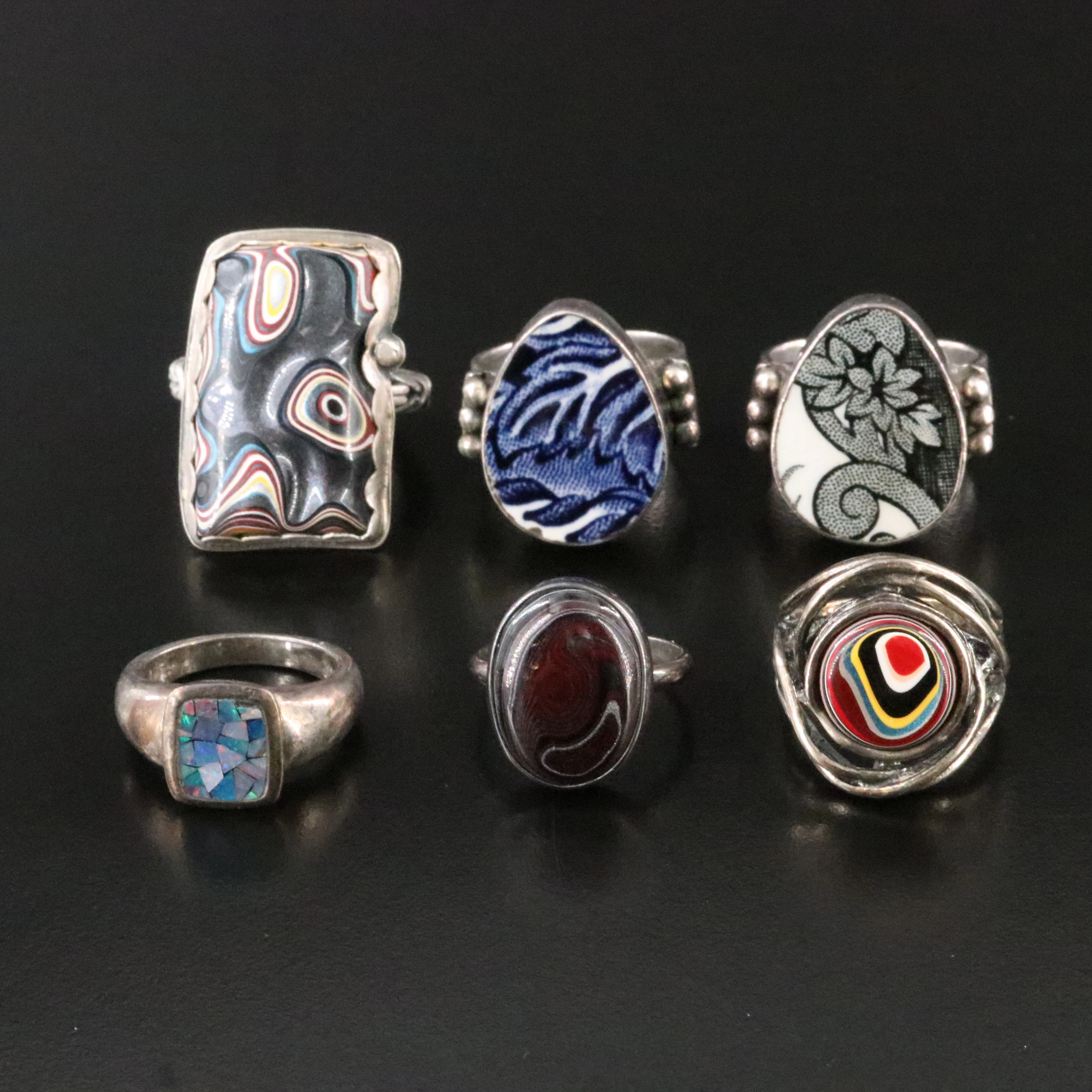 China Baroque, Opal, Porcelain and Fordite Featured in Sterling Rings