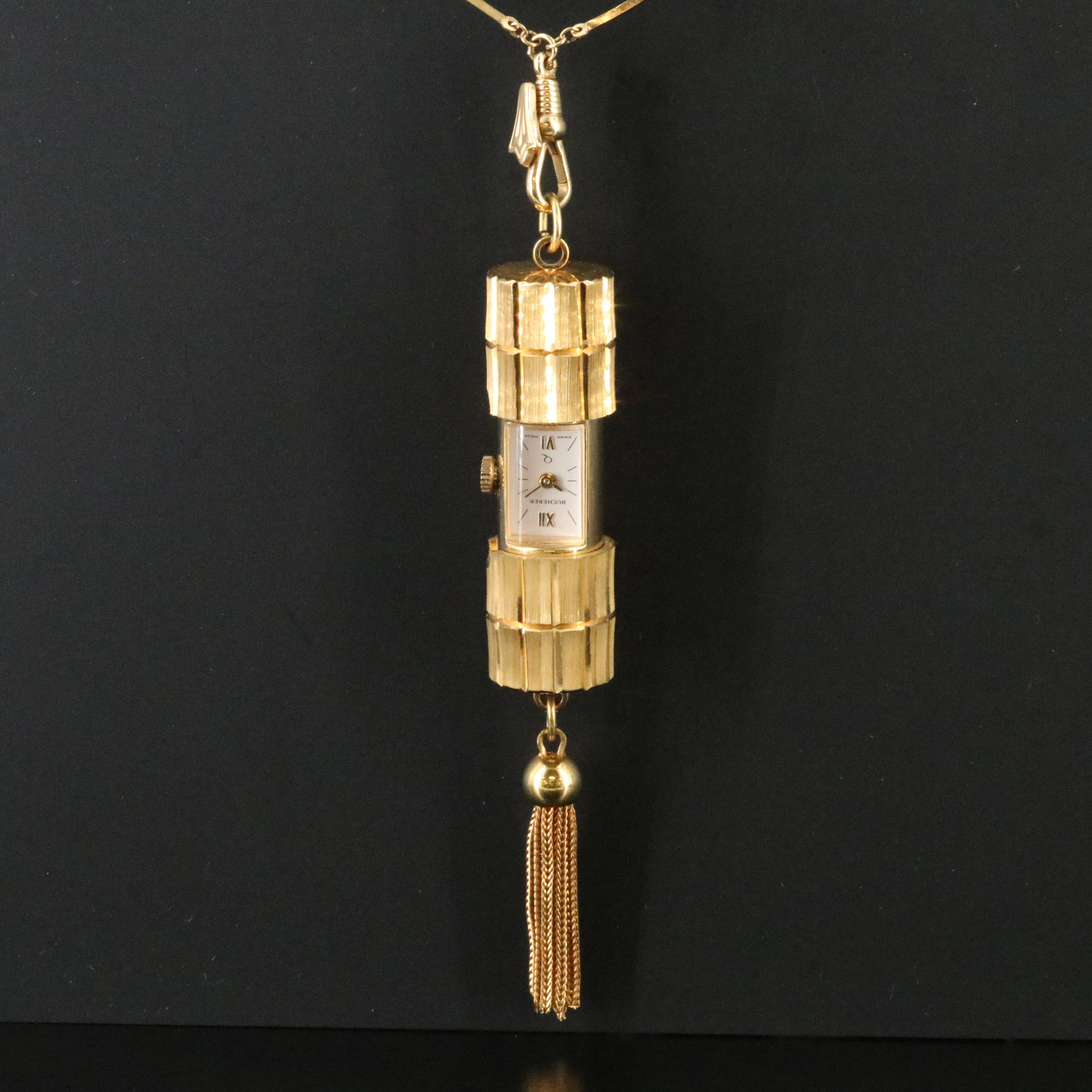 Bucherer Cylindrical Slide Gold Tone Pendant Watch