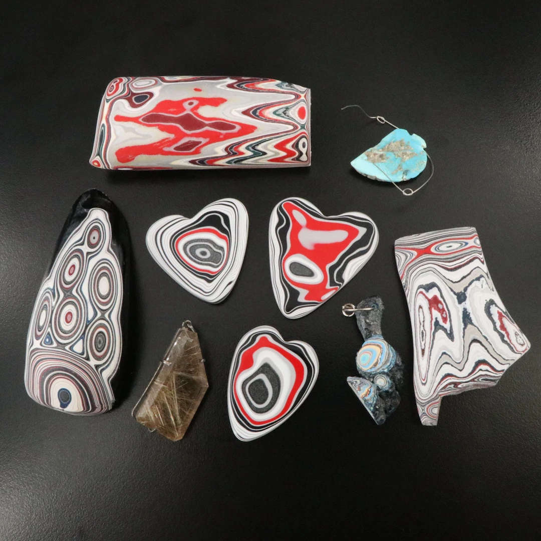 Lot Featuring Fordite, Rutilated Quartz and Turquoise