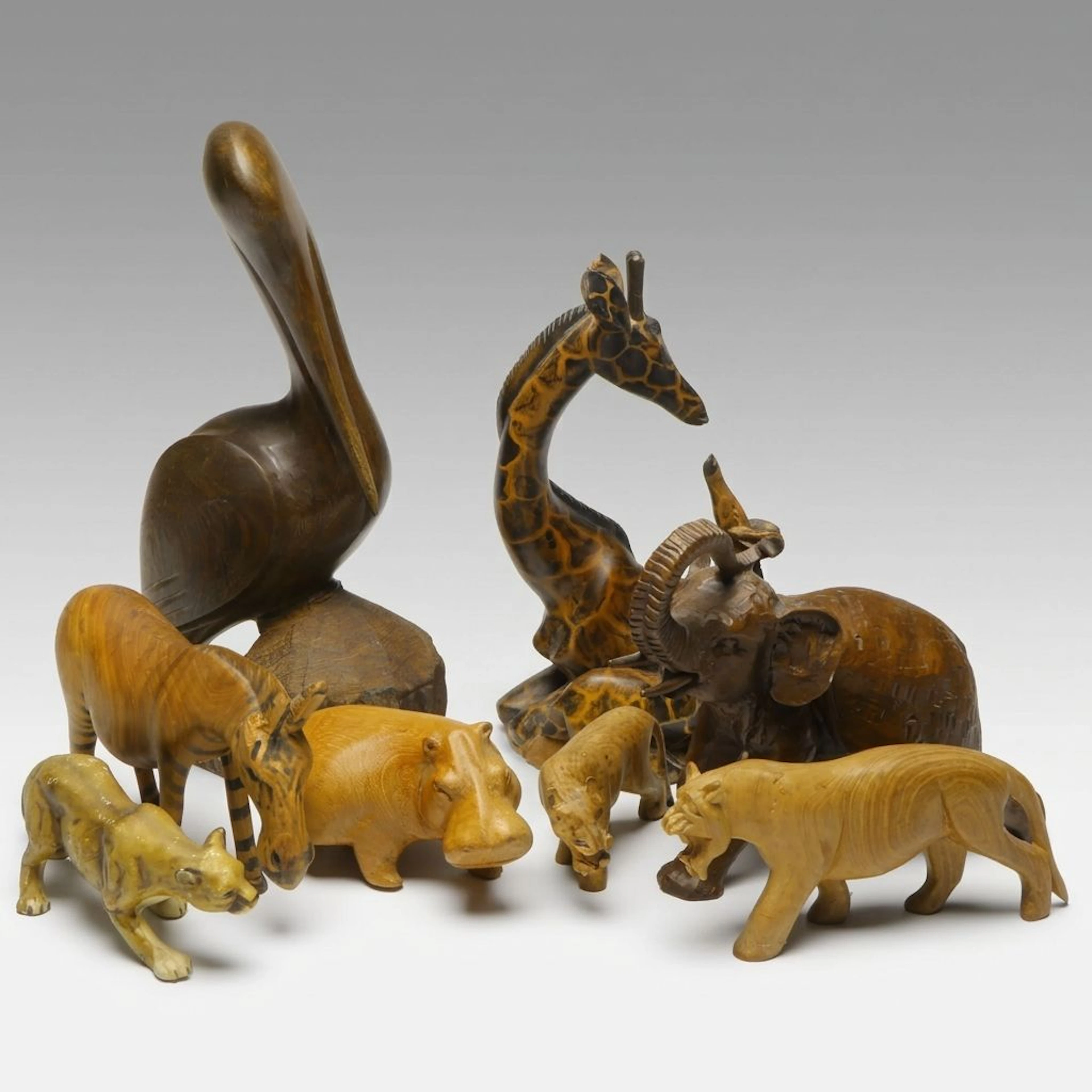 Hand-Carved Wood Pelican with Hippo, Zebra and Other Animal Figurines