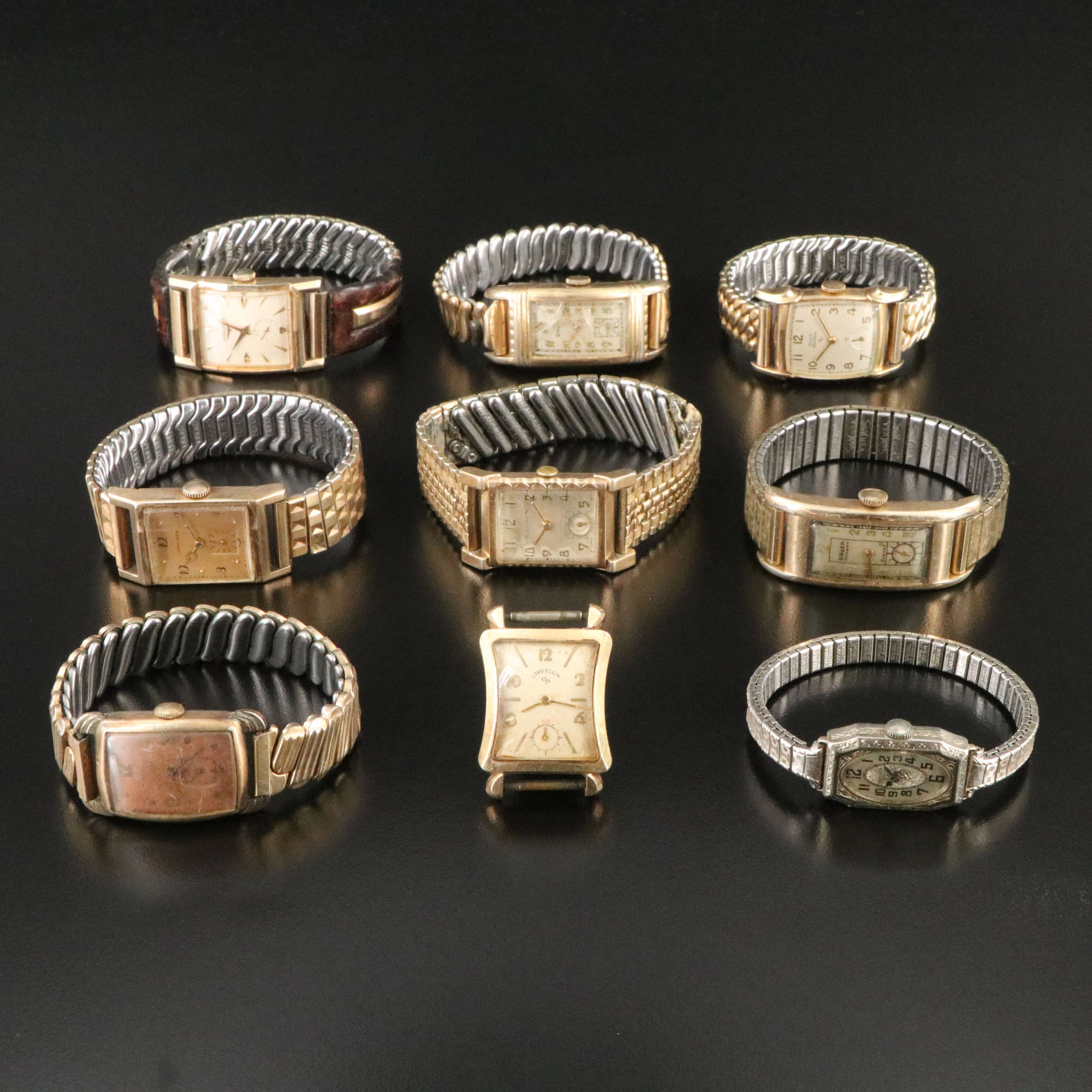 Collection of Vintage Stem Wind Watches Featuring Longines and Gruen