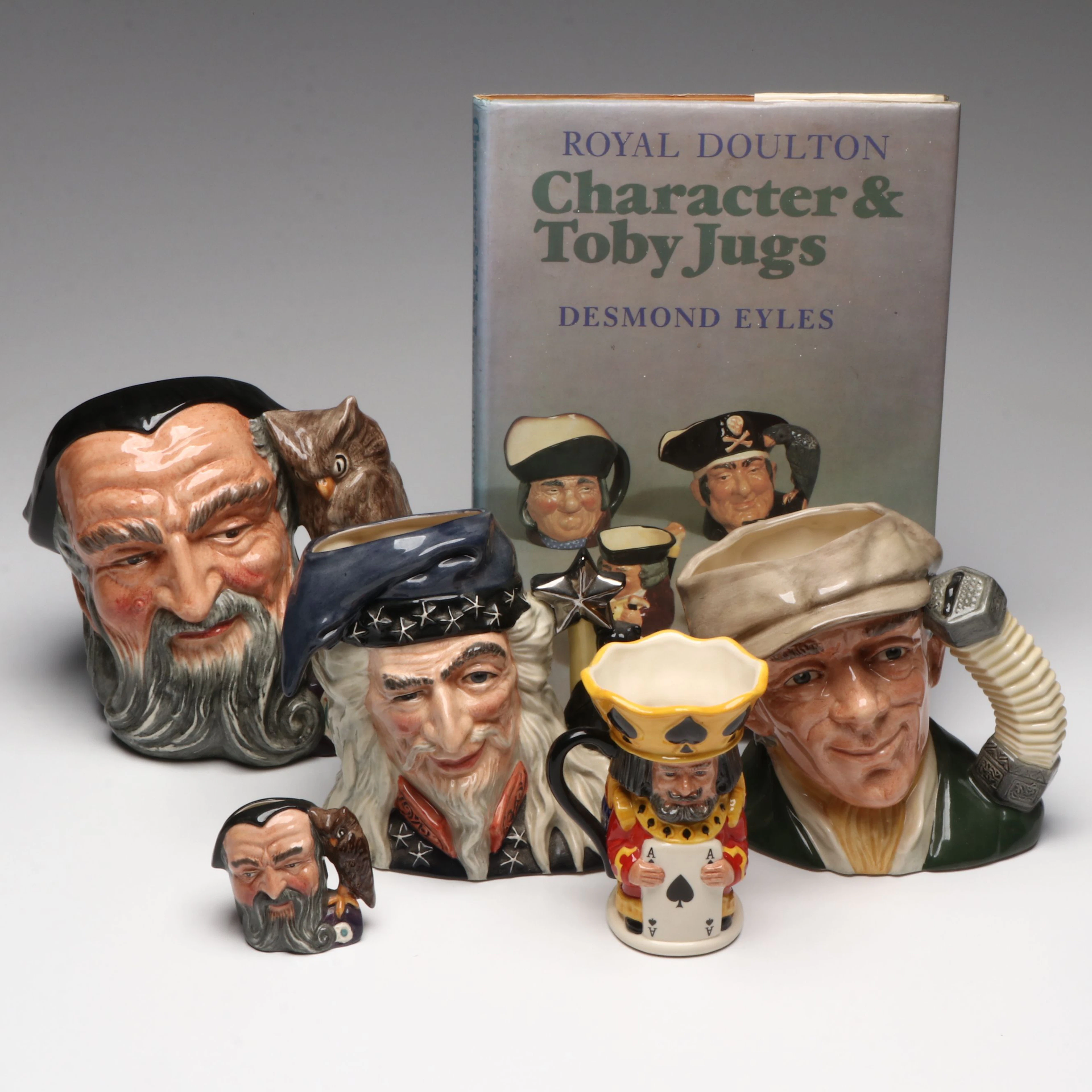 Royal Doulton "Merlin, "The Wizard" with More Toby Jugs and Collector's Book