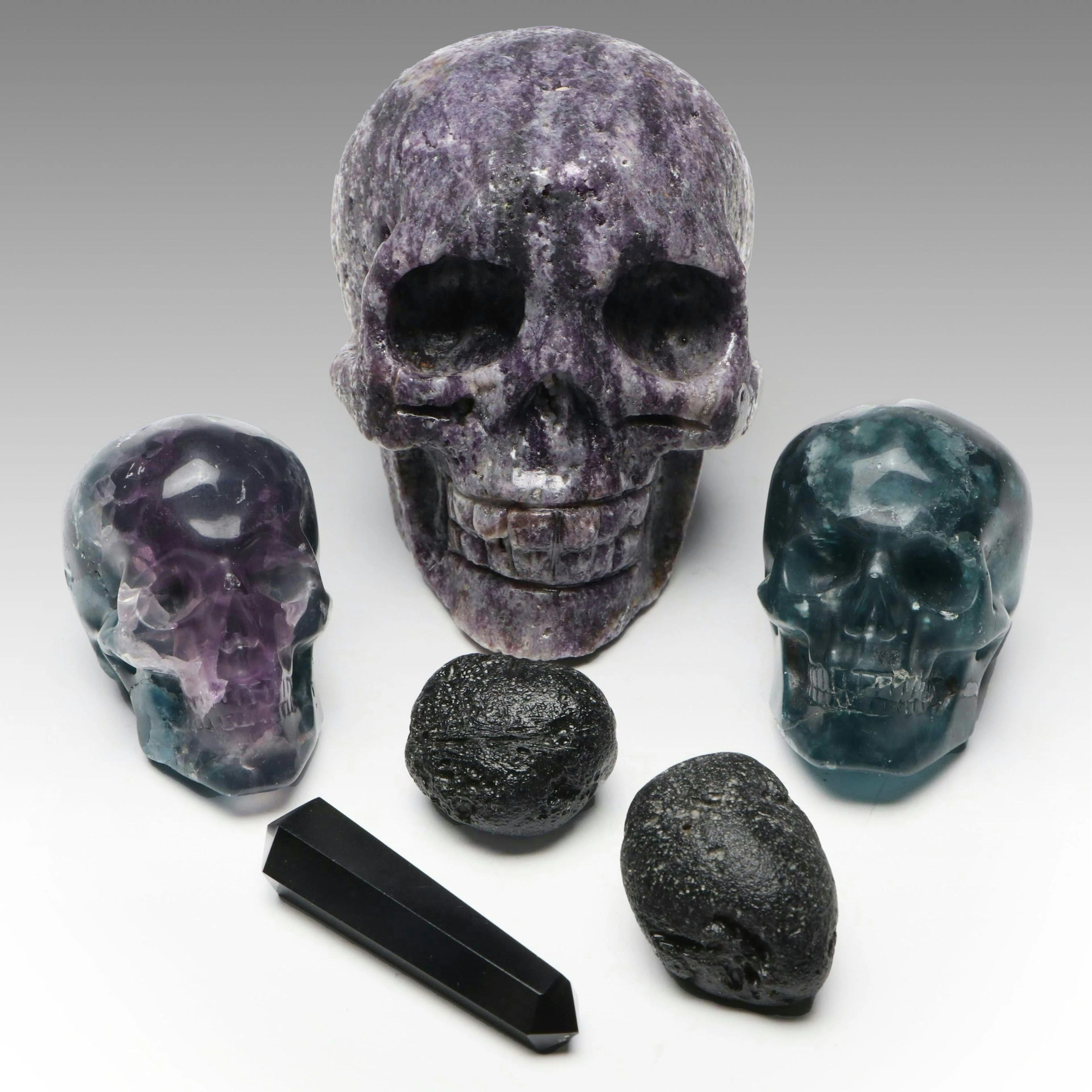 Fluorite and Amethyst Skulls with Other Obsidian Specimens