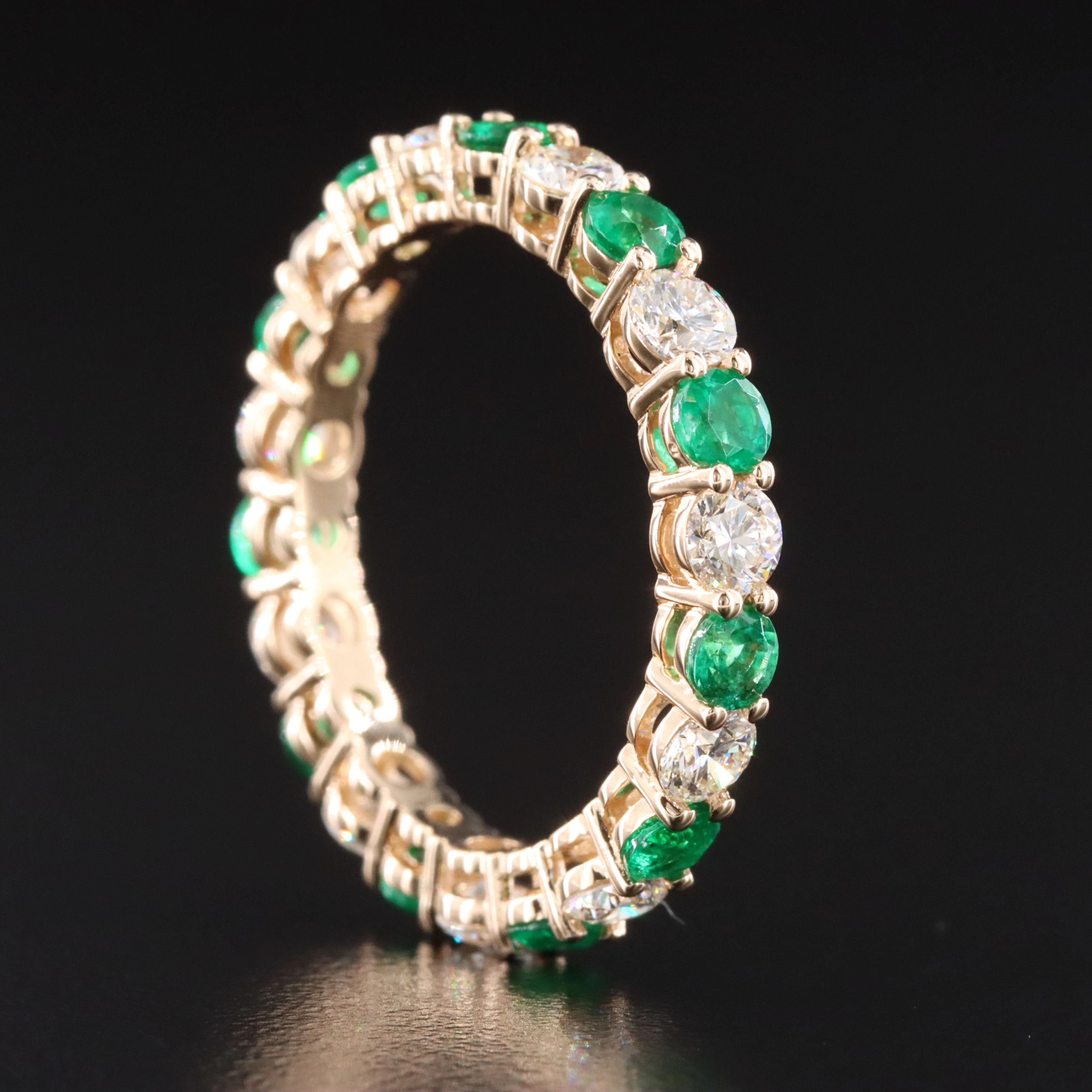 14K 1.22 CTW Diamond and Emerald Eternity Band