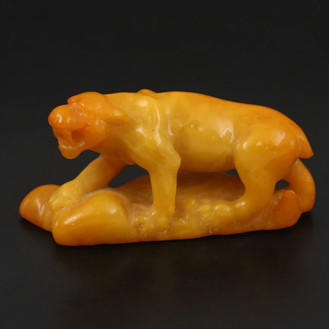 Chinese Carved Mutton Fat Amber Saber Tooth Tiger
